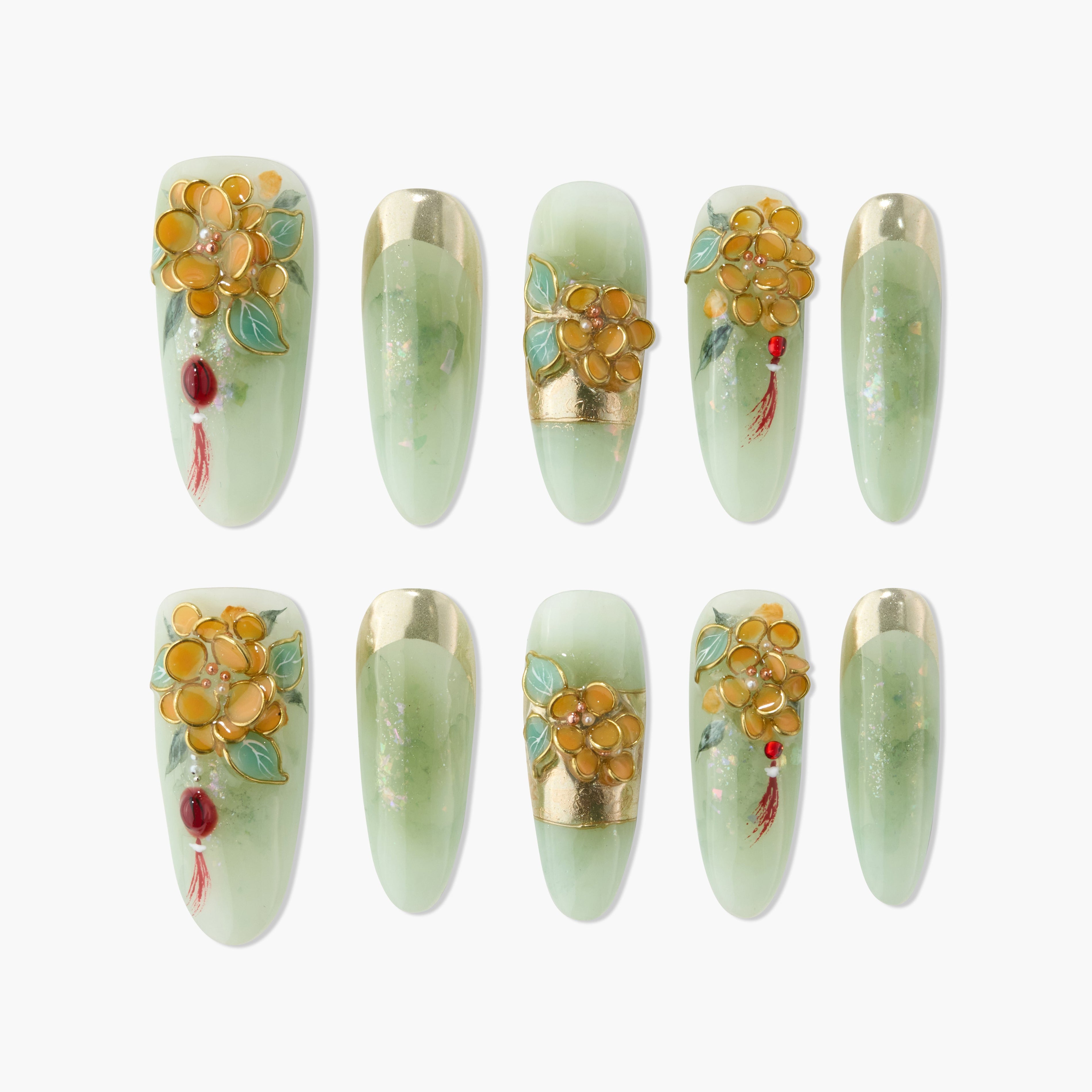 Green press-on nails with gold French tips and 3D yellow floral designs