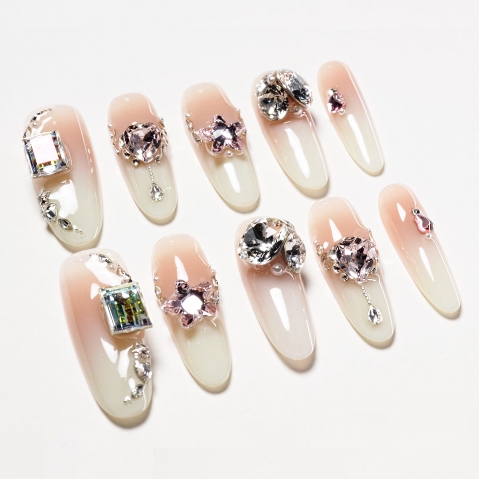 Handmade long ombre press-on nails with rhinestone and gem embellishments