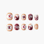 Handmade Christmas press-on nails with snowman and snowflake designs in red and nude tones