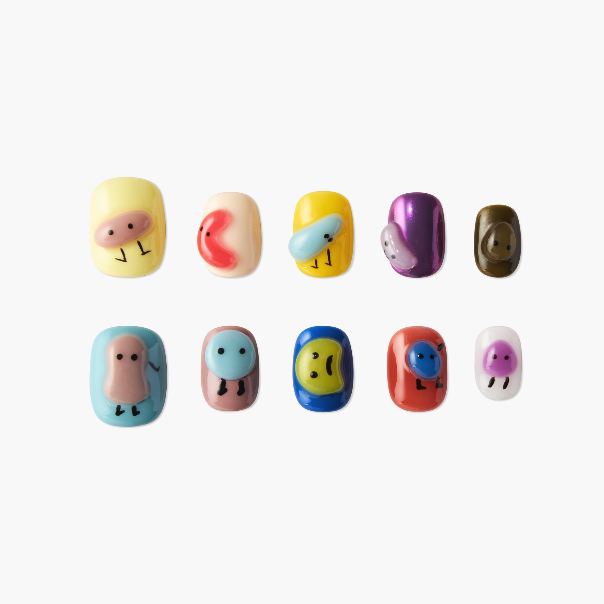 Handmade press-on nails with colorful 3D cartoon characters on a white background