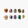 Colorful handmade press-on nails with 3D heart, pearls, floral, and gem embellishments