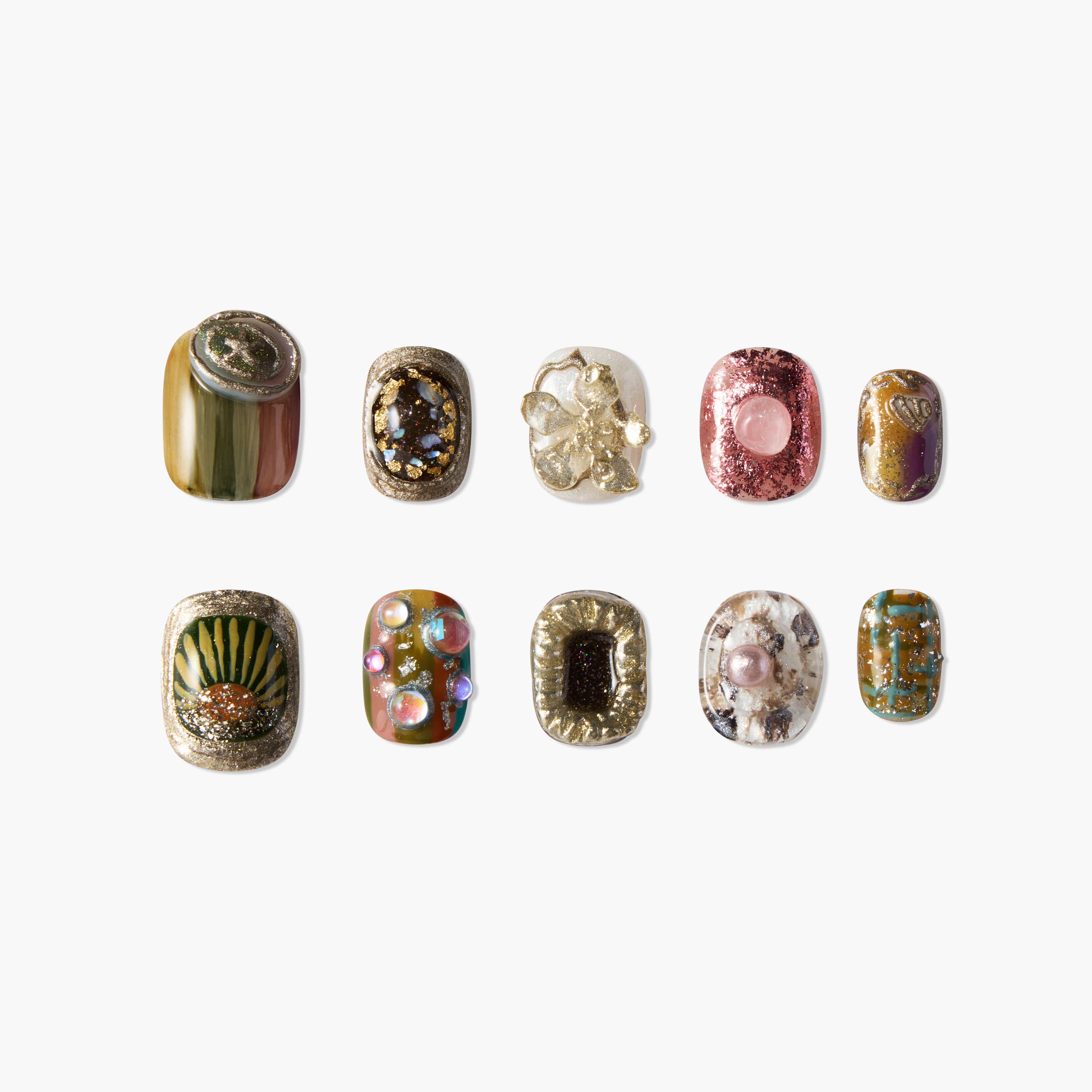 Ten handmade press-on nails with mixed gold, green, pink, and abstract gemstone designs.