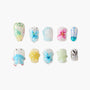 Handmade press-on nails with colorful 3D butterfly and floral designs on a white background