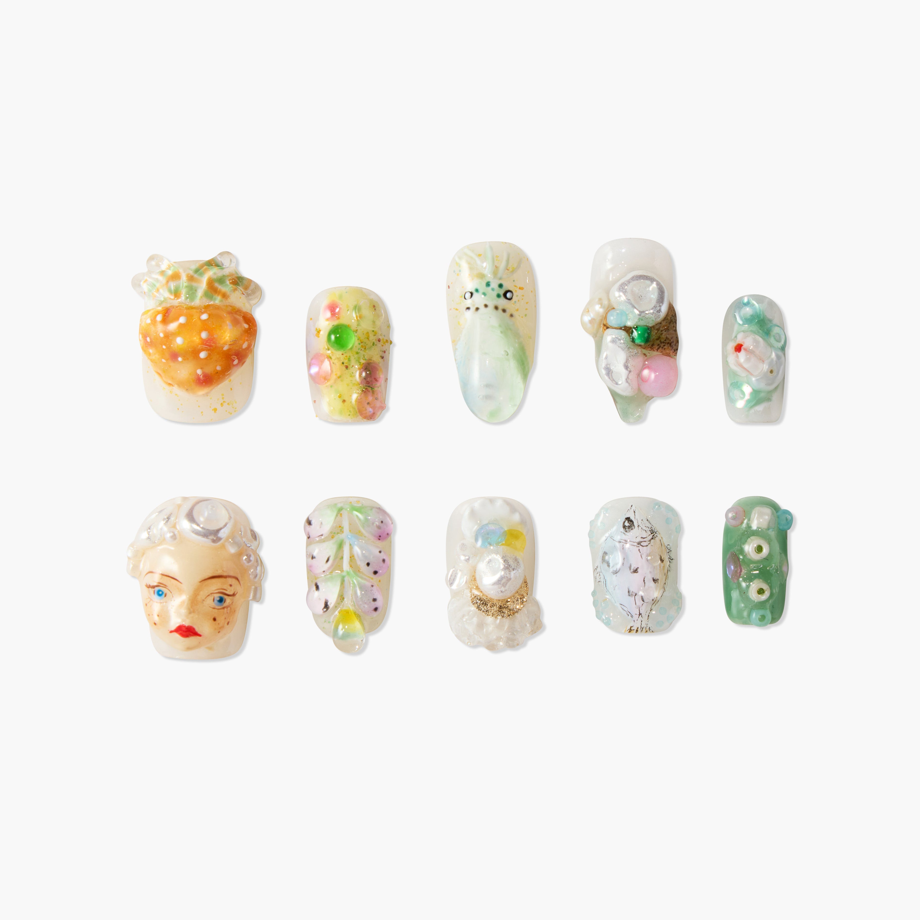 Handmade press-on nails set with colorful, 3D abstract art and textured designs