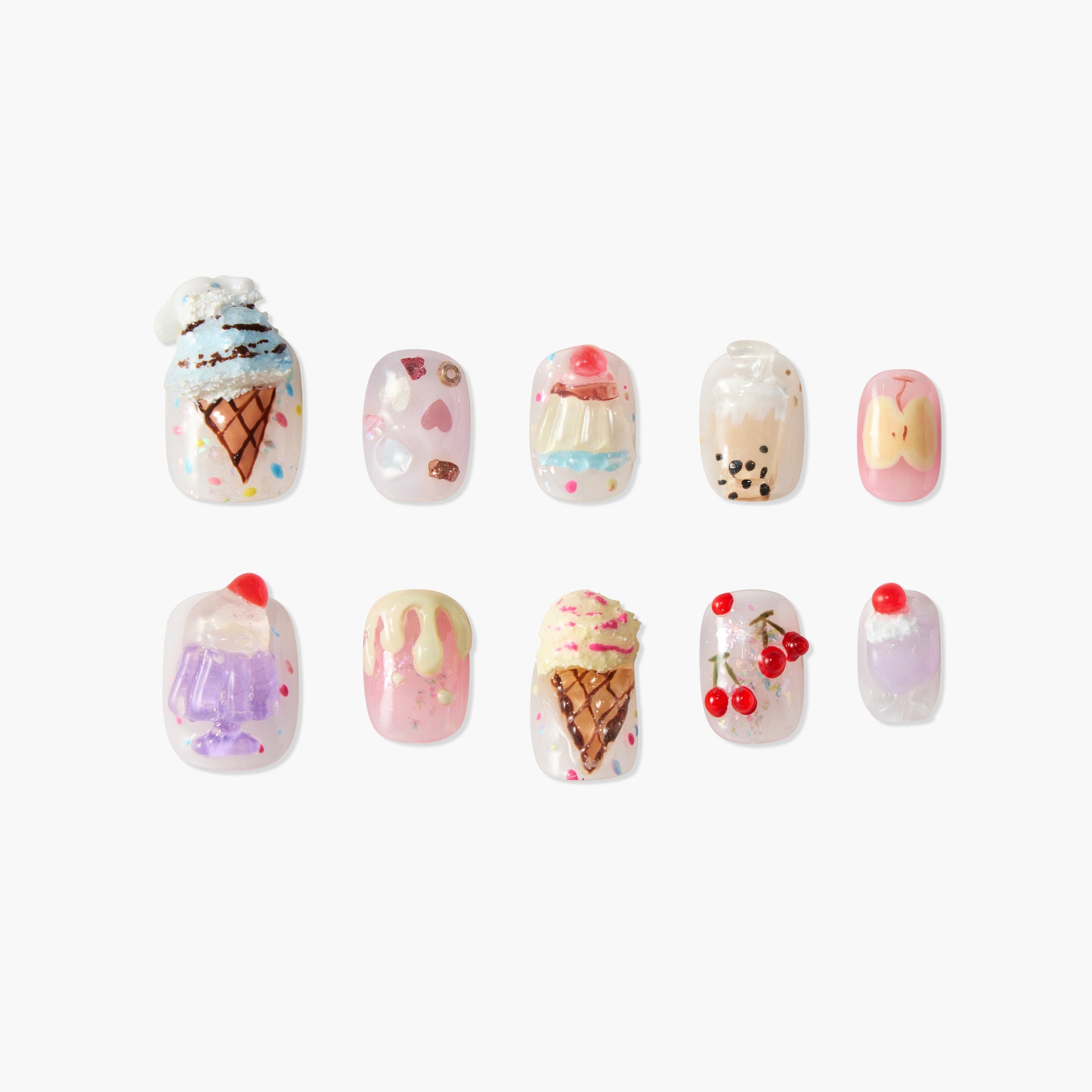 Handmade press-on nails with dessert designs like ice cream, cupcake, cherries, and boba tea.