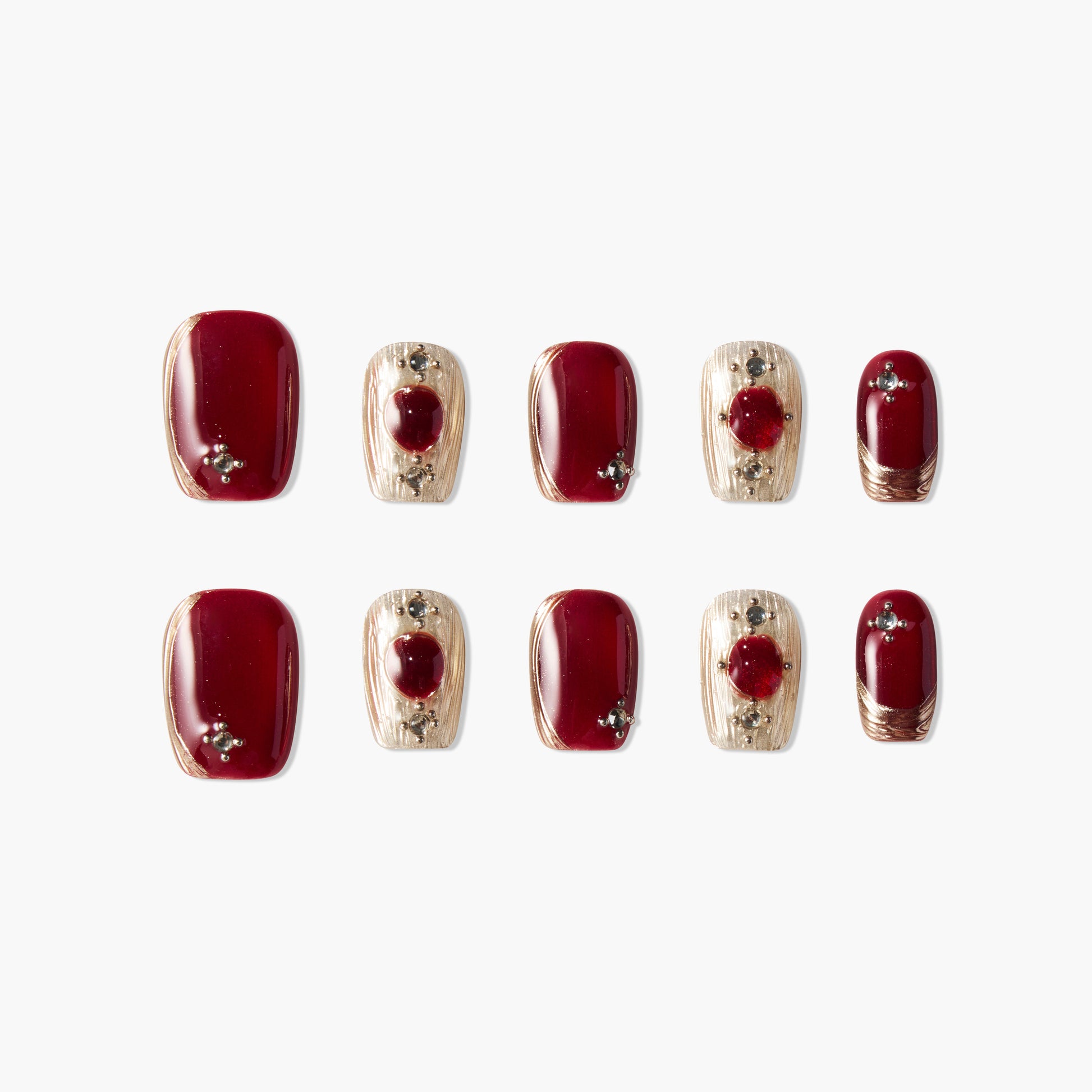 Handmade press-on nails set with glossy burgundy and gold designs, jewel accents, and almond shape