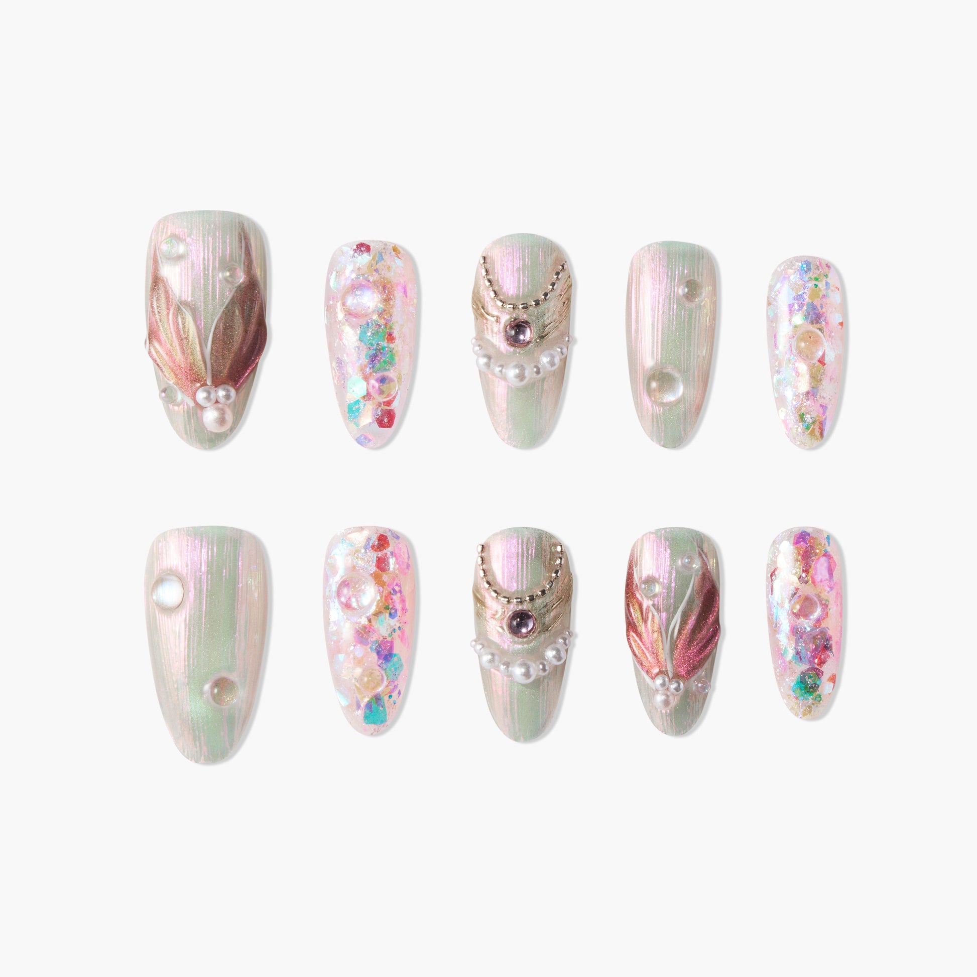 Handmade press-on nails with pearl, gemstone, and floral embellishments in iridescent pastel colors.