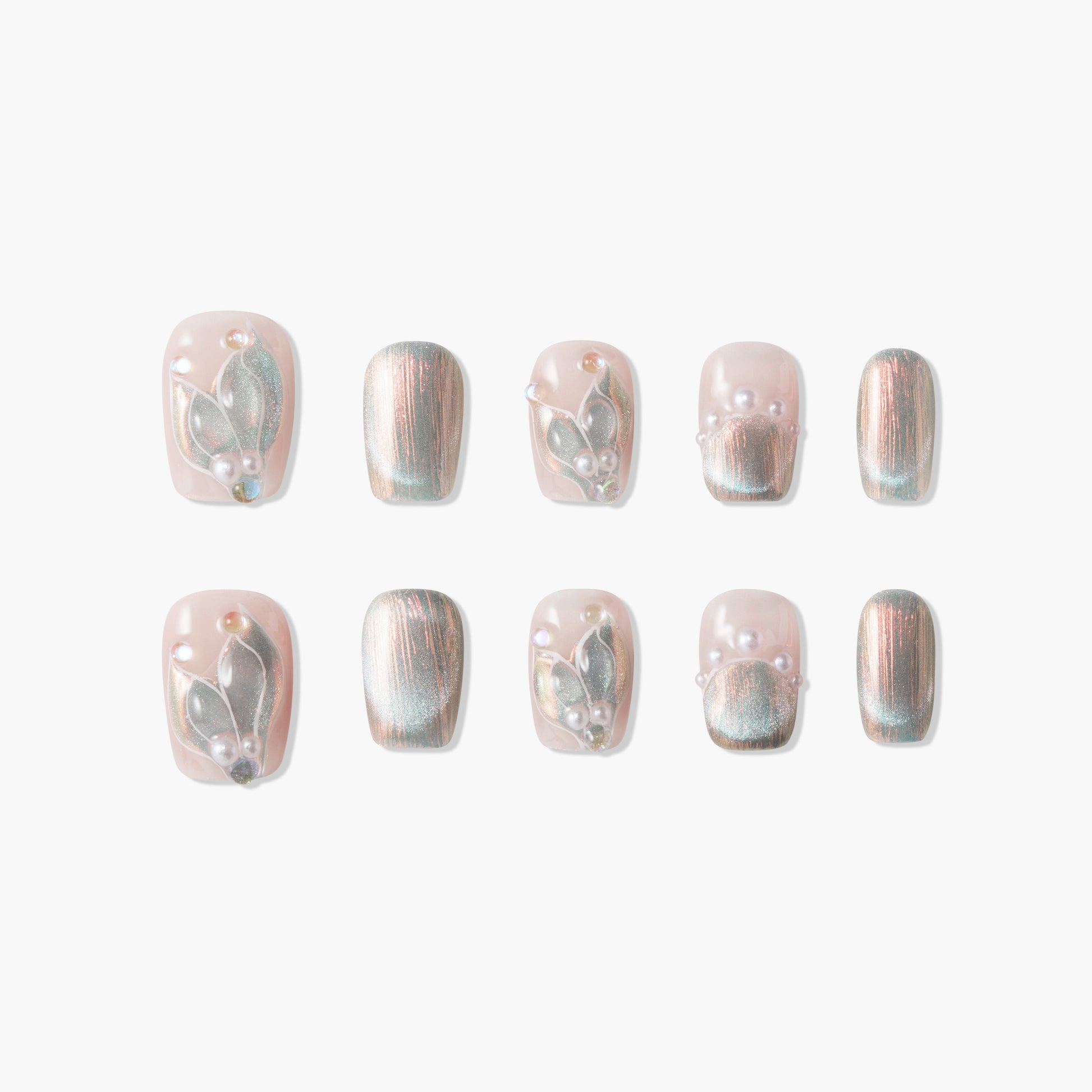 Handmade press-on nails with a shimmery pink base, pearl accents, and 3D floral designs