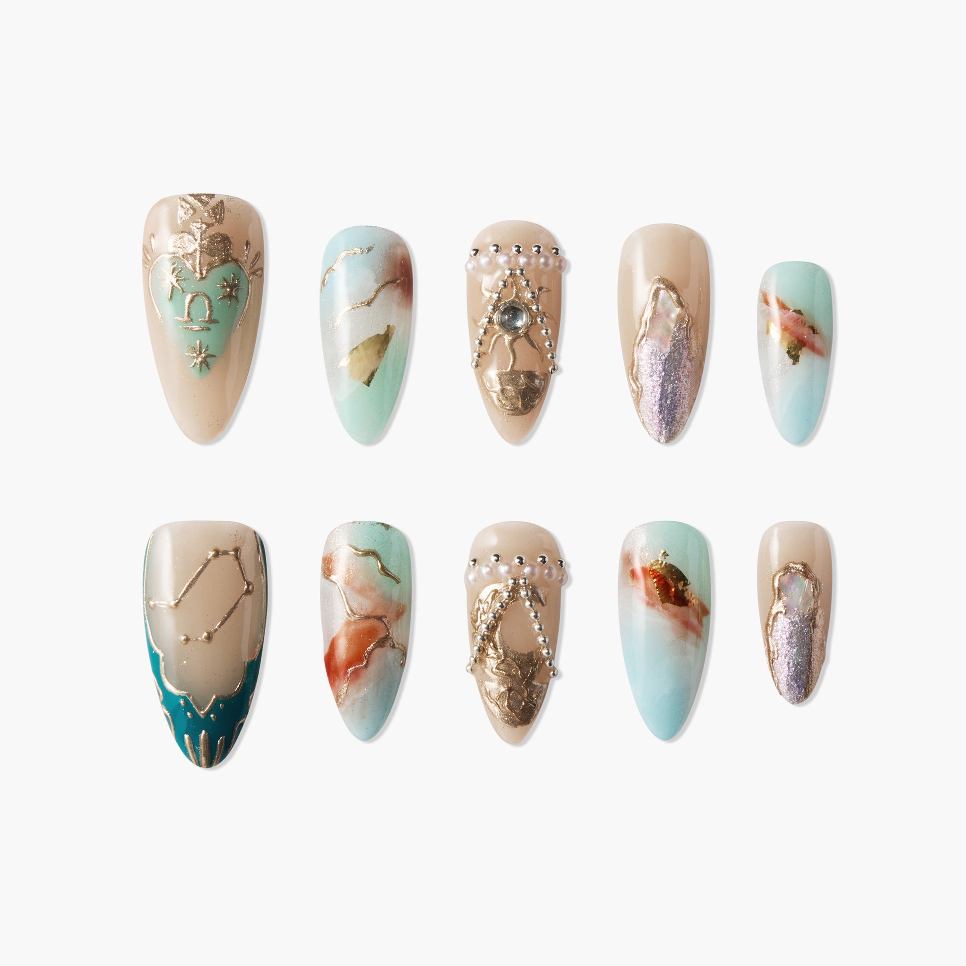 Handmade press-on nails with pastel marble design, gold accents, and gem embellishments