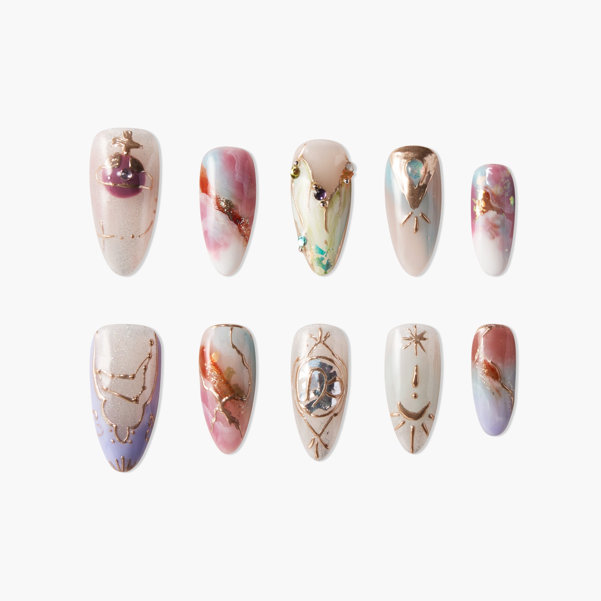 Handmade press-on nails with abstract marble patterns, gold accents, and celestial designs.