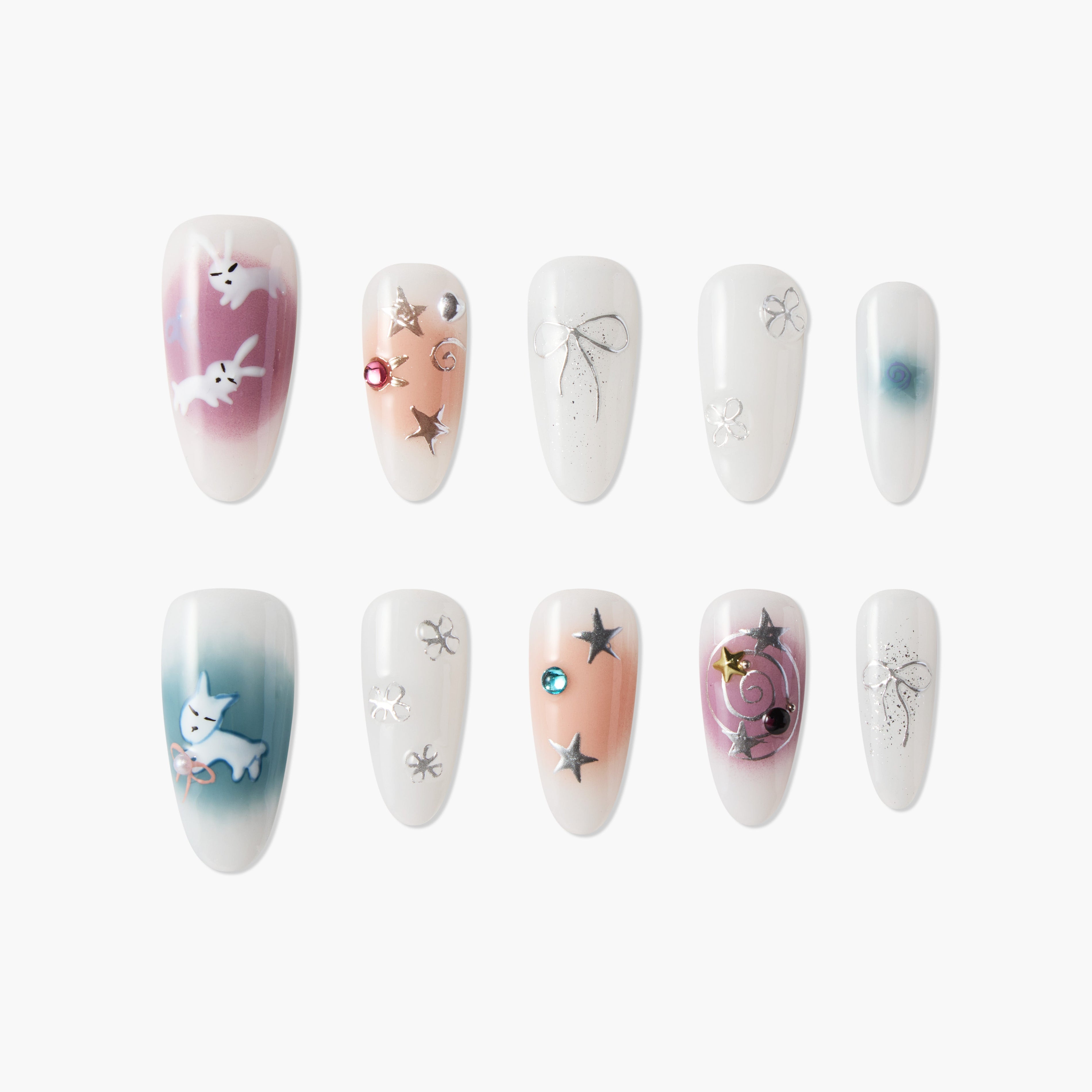 Handmade press-on nails set with bunny, bow, star, and floral nail art designs