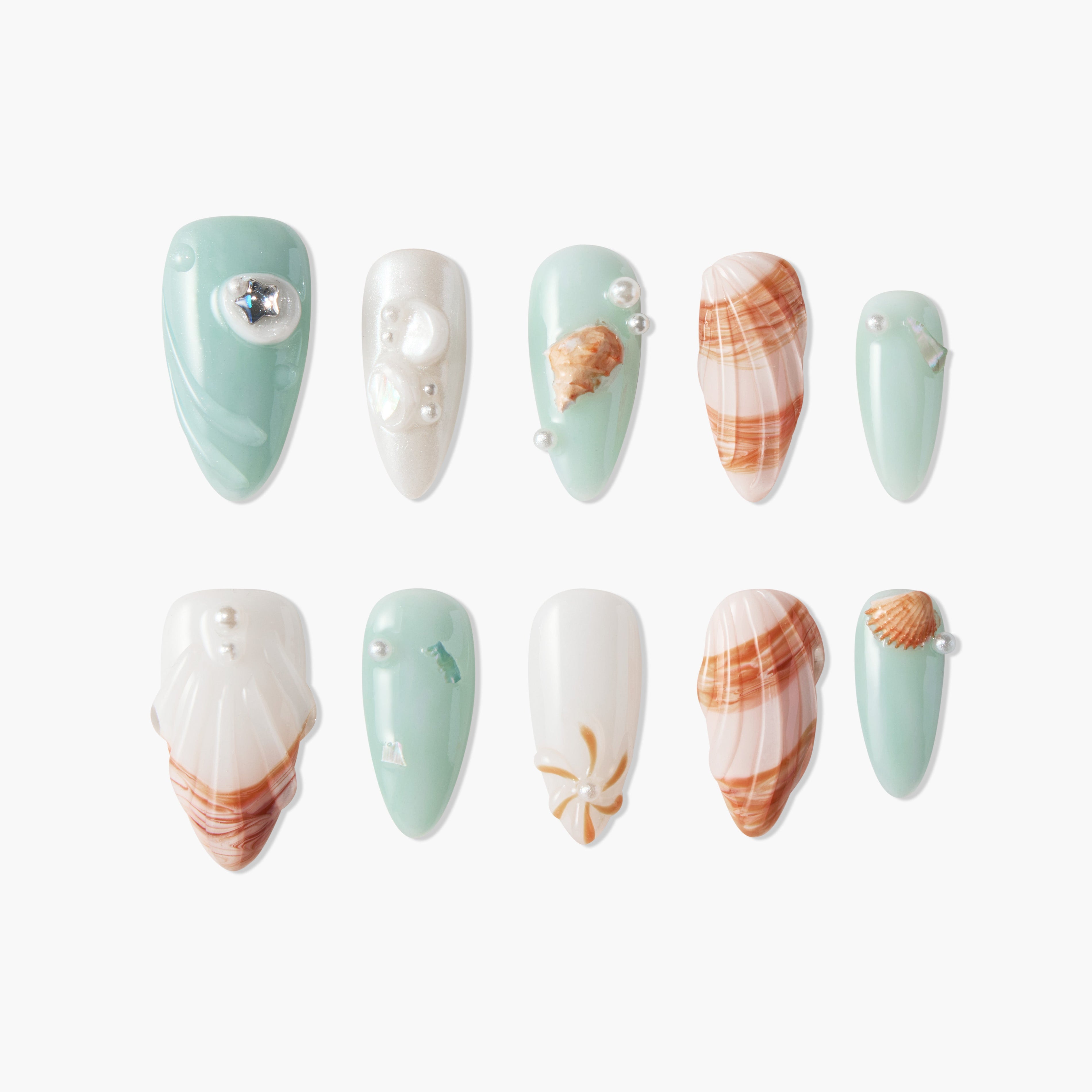 Ocean-themed handmade press-on nails with seashell, pearl, and starfish decorations