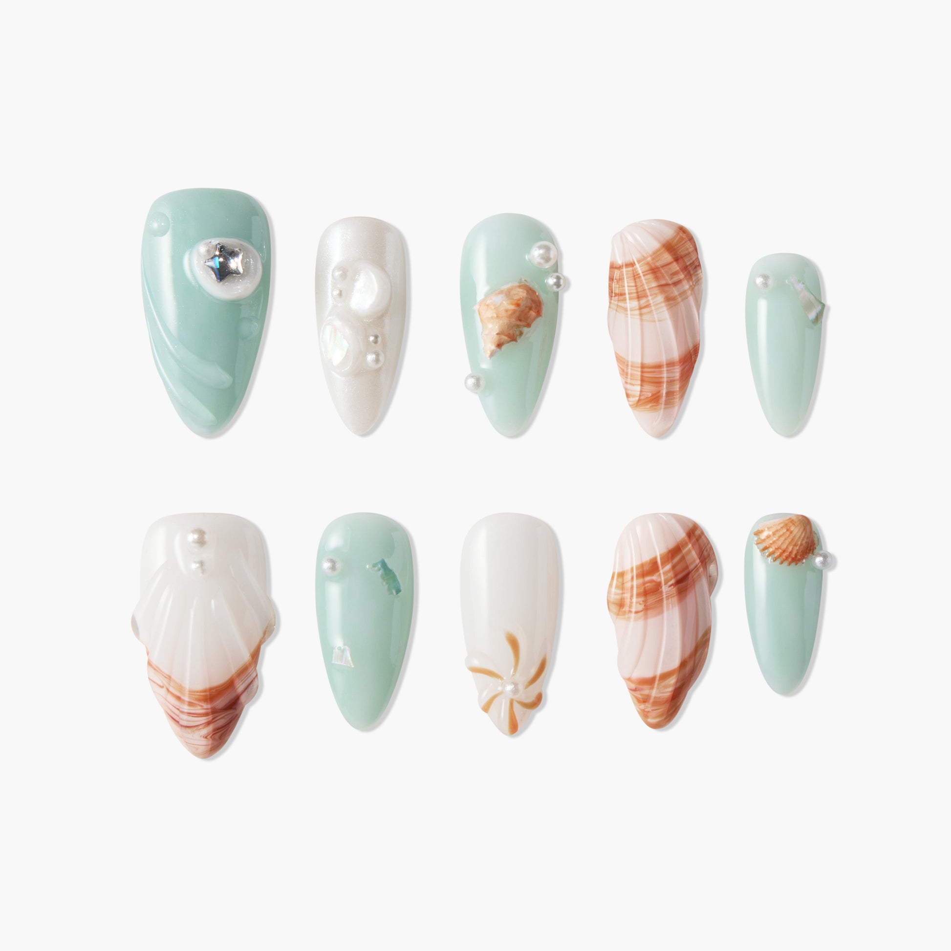Ocean-themed handmade press-on nails with seashell, pearl, and starfish decorations