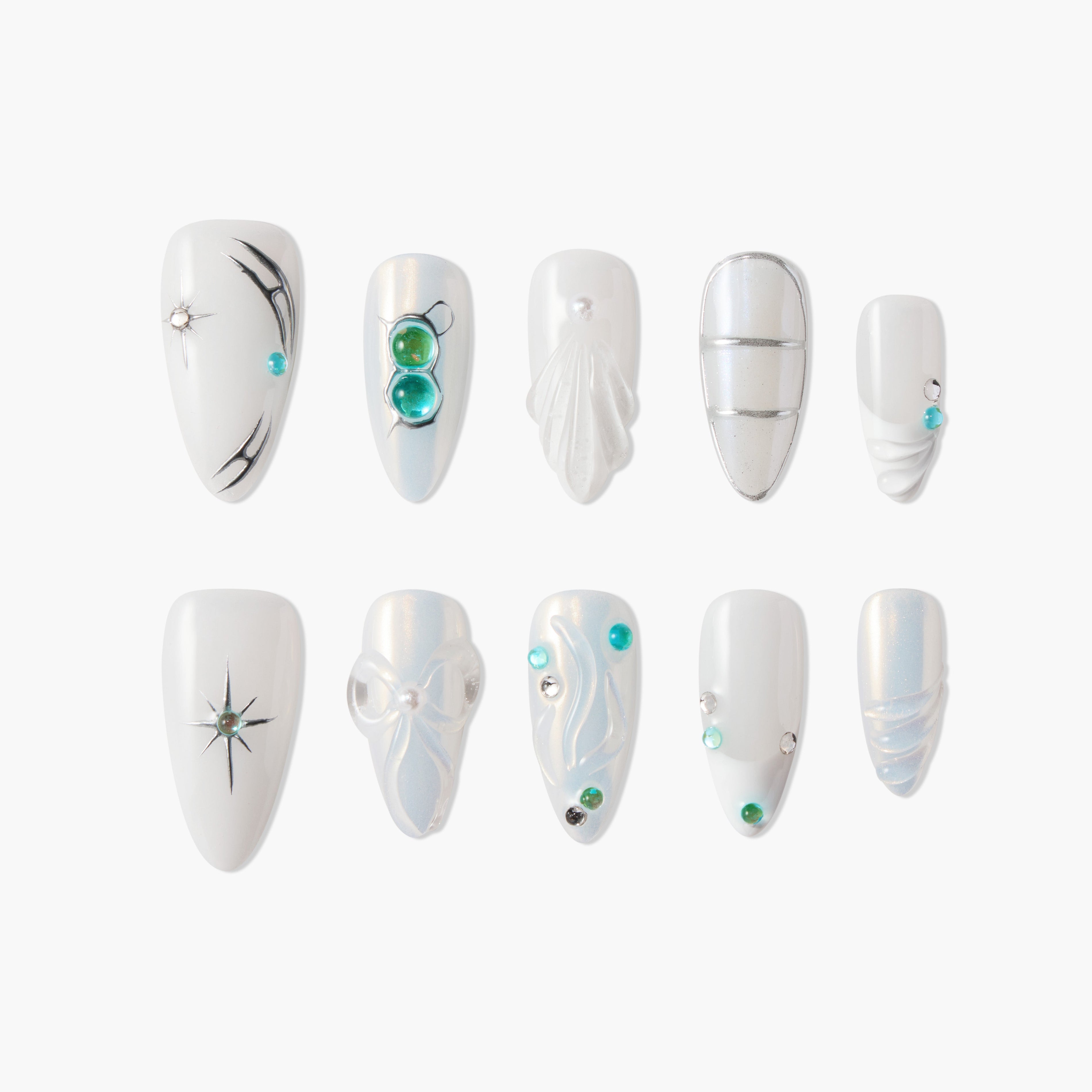White press-on nails with pearl, silver, and turquoise stone accents, various elegant designs