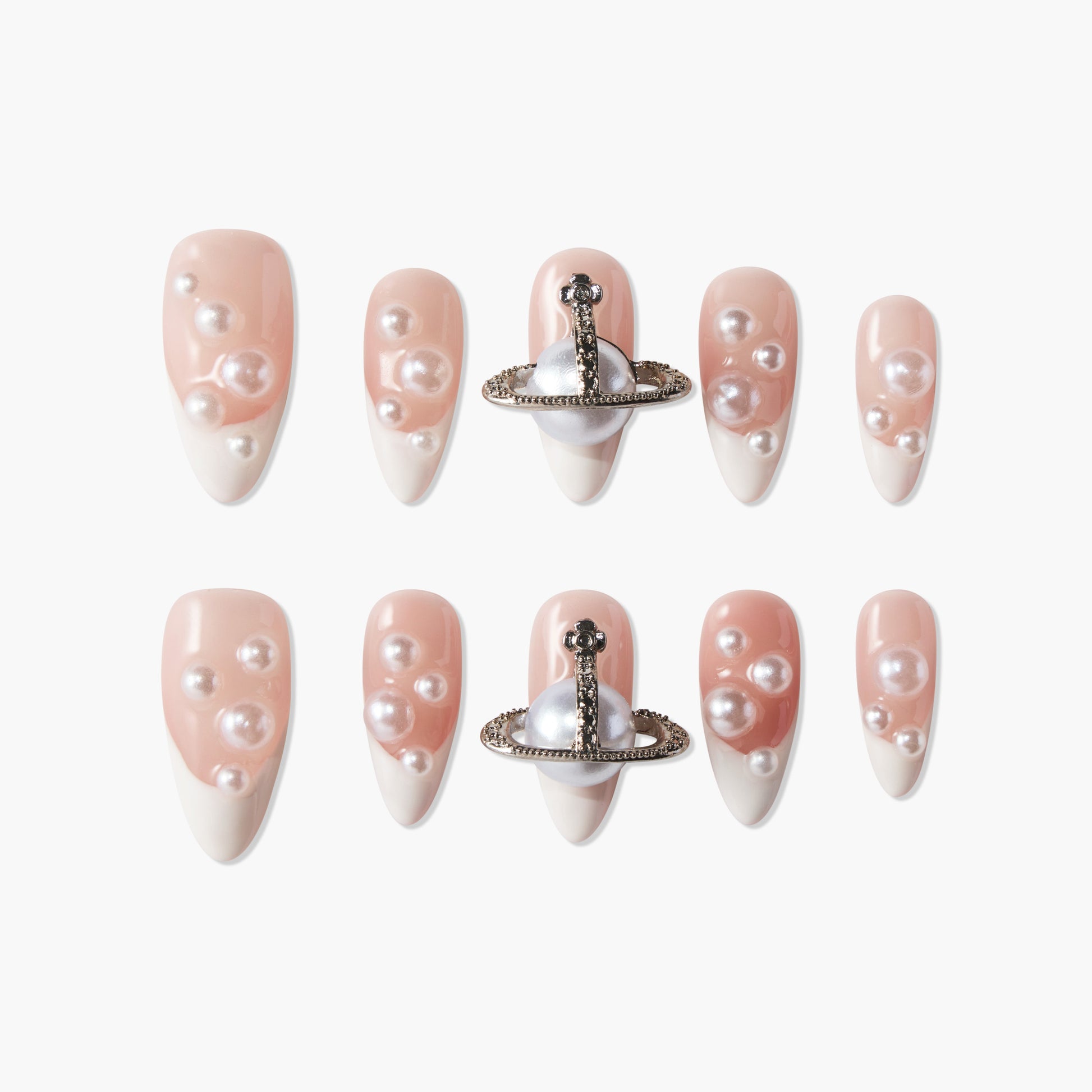 Handmade press-on nails with pearl accents and metallic 3D embellishments on nude French tips