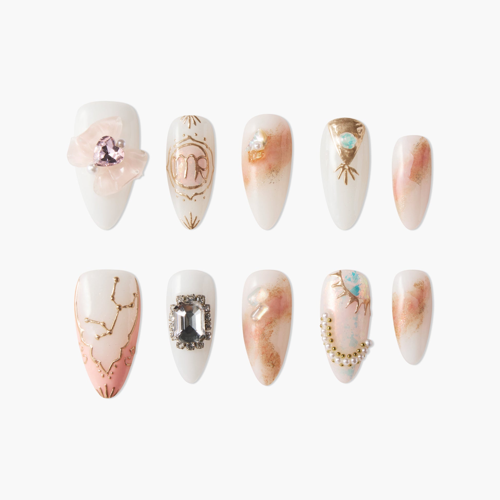 Handmade press-on nails with celestial and gold designs, pearls, and gemstone accents.