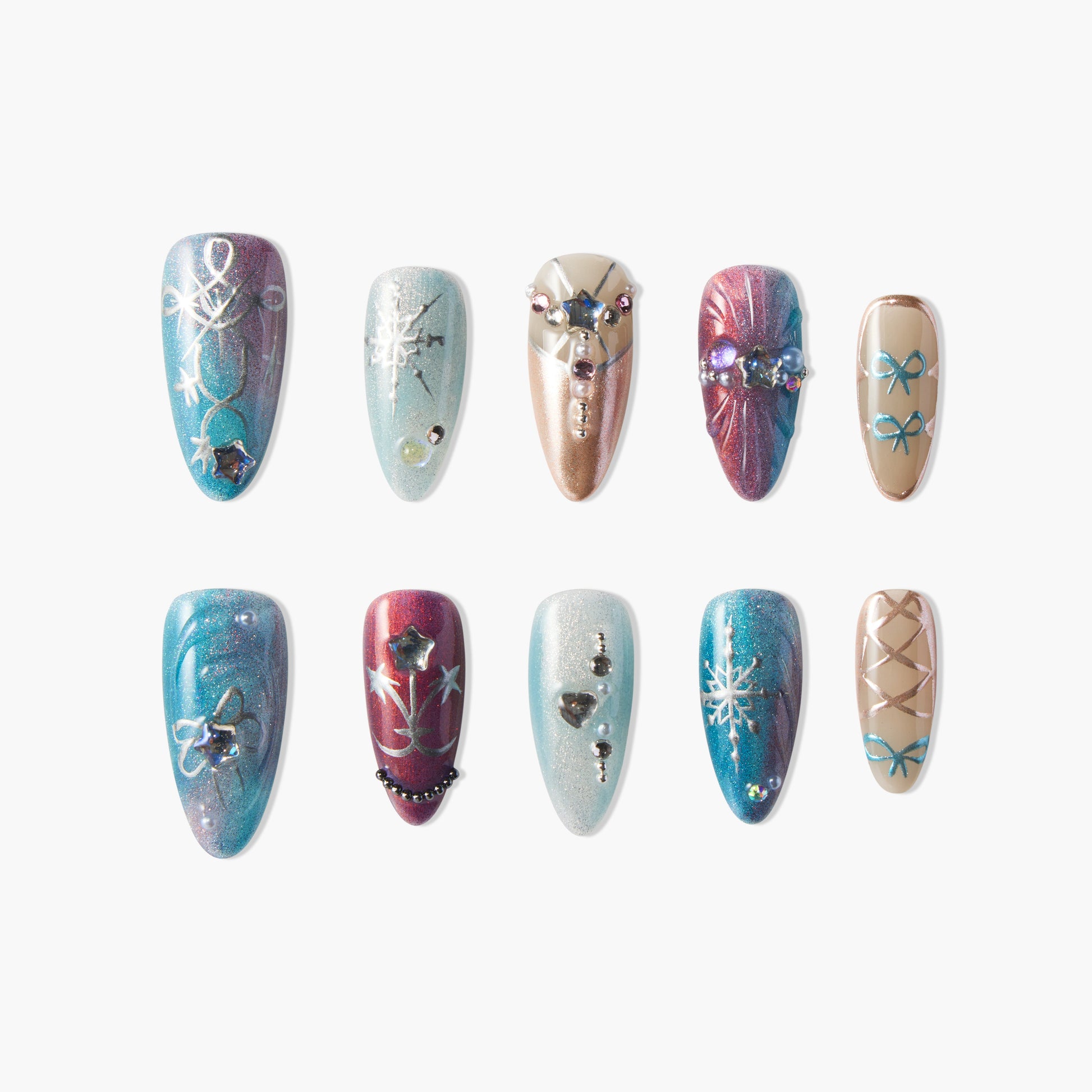 Handmade press-on nails set with glitter, blue and nude tones, rhinestones, bow and star designs