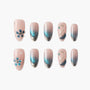 Blue and nude ombre press-on nails with 3D floral and gemstone accents, handmade nail art set