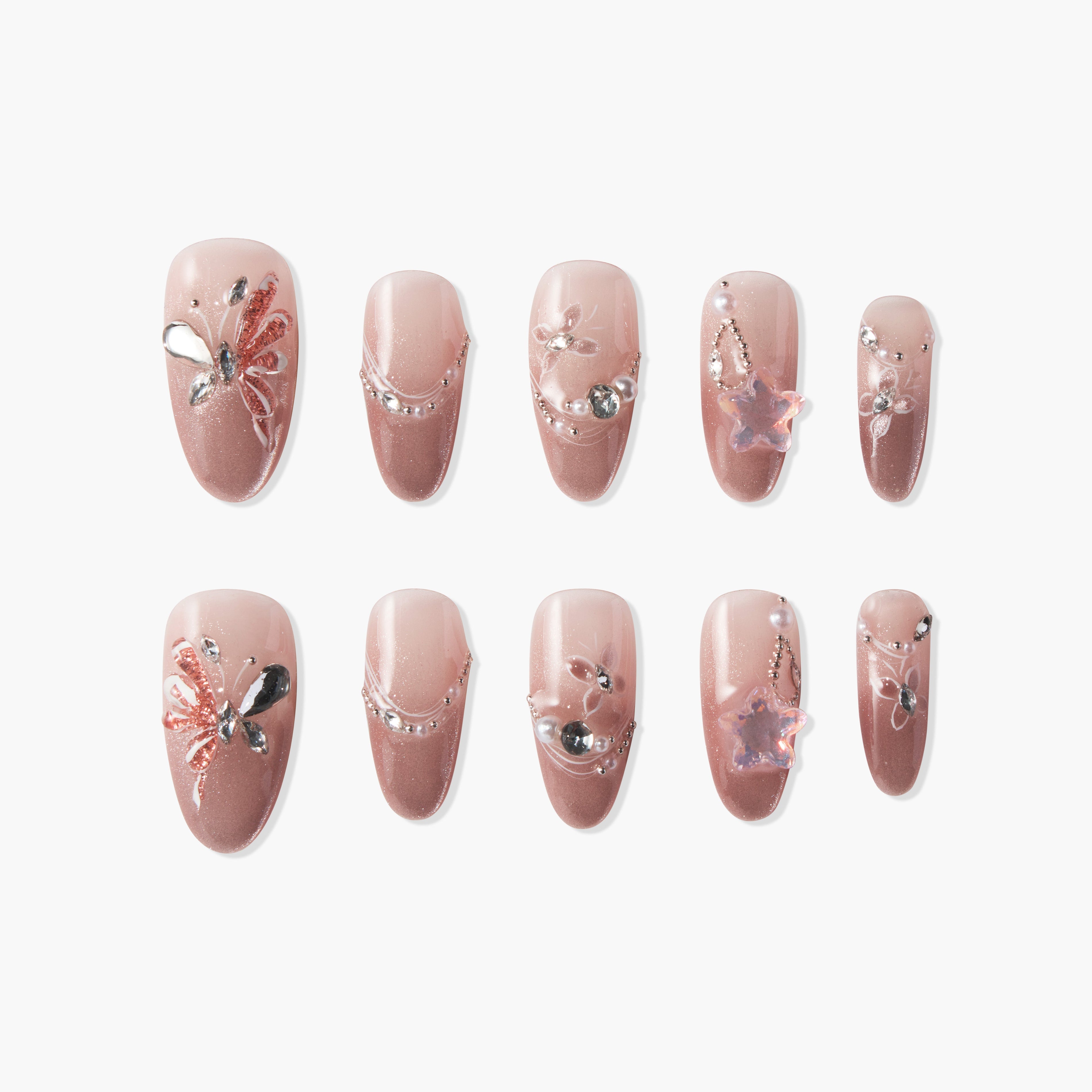 Handmade pink ombre press-on nails with butterfly, rhinestone, and floral 3D designs