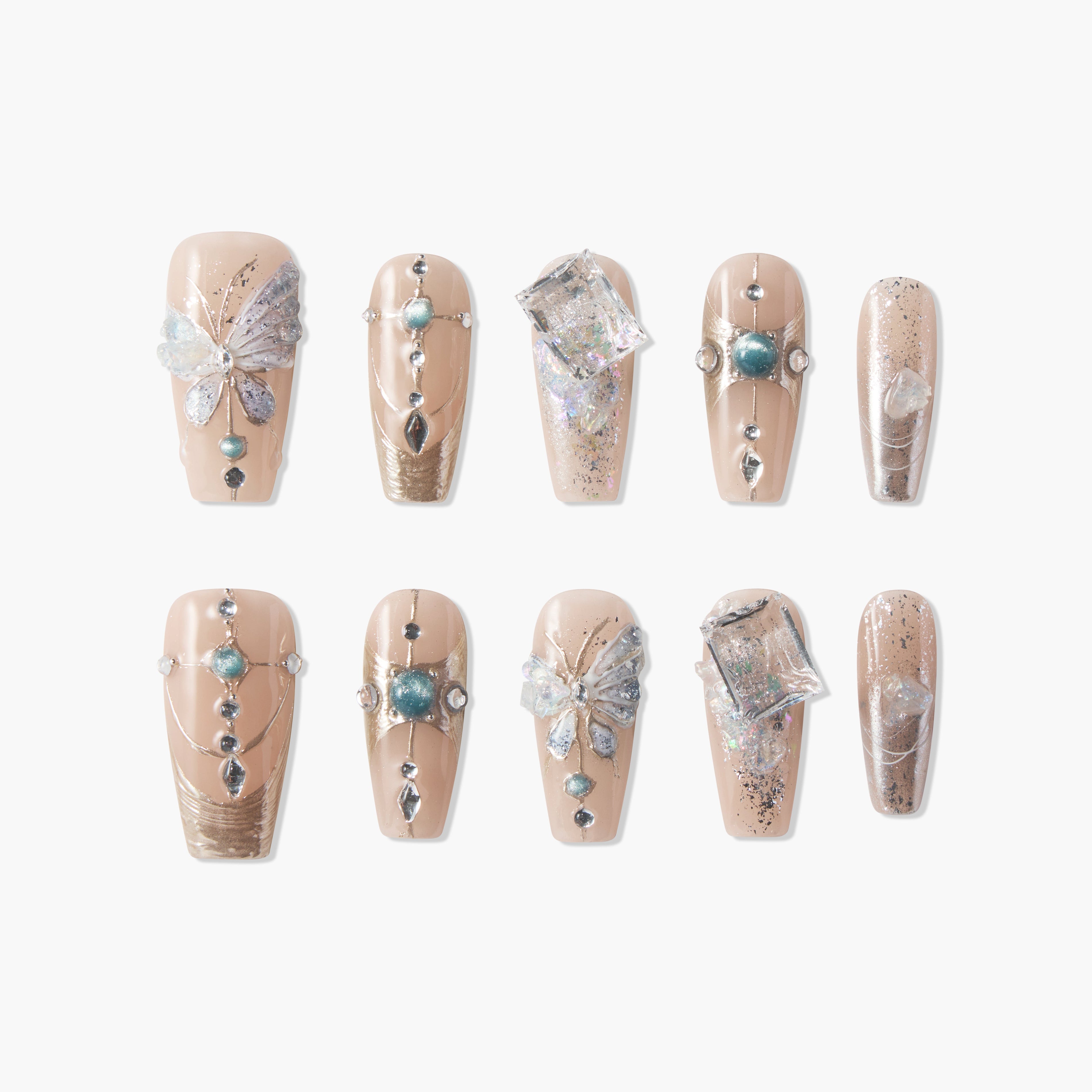 Handmade nude press-on nails with 3D butterfly, gems, metallic accents, and glitter details