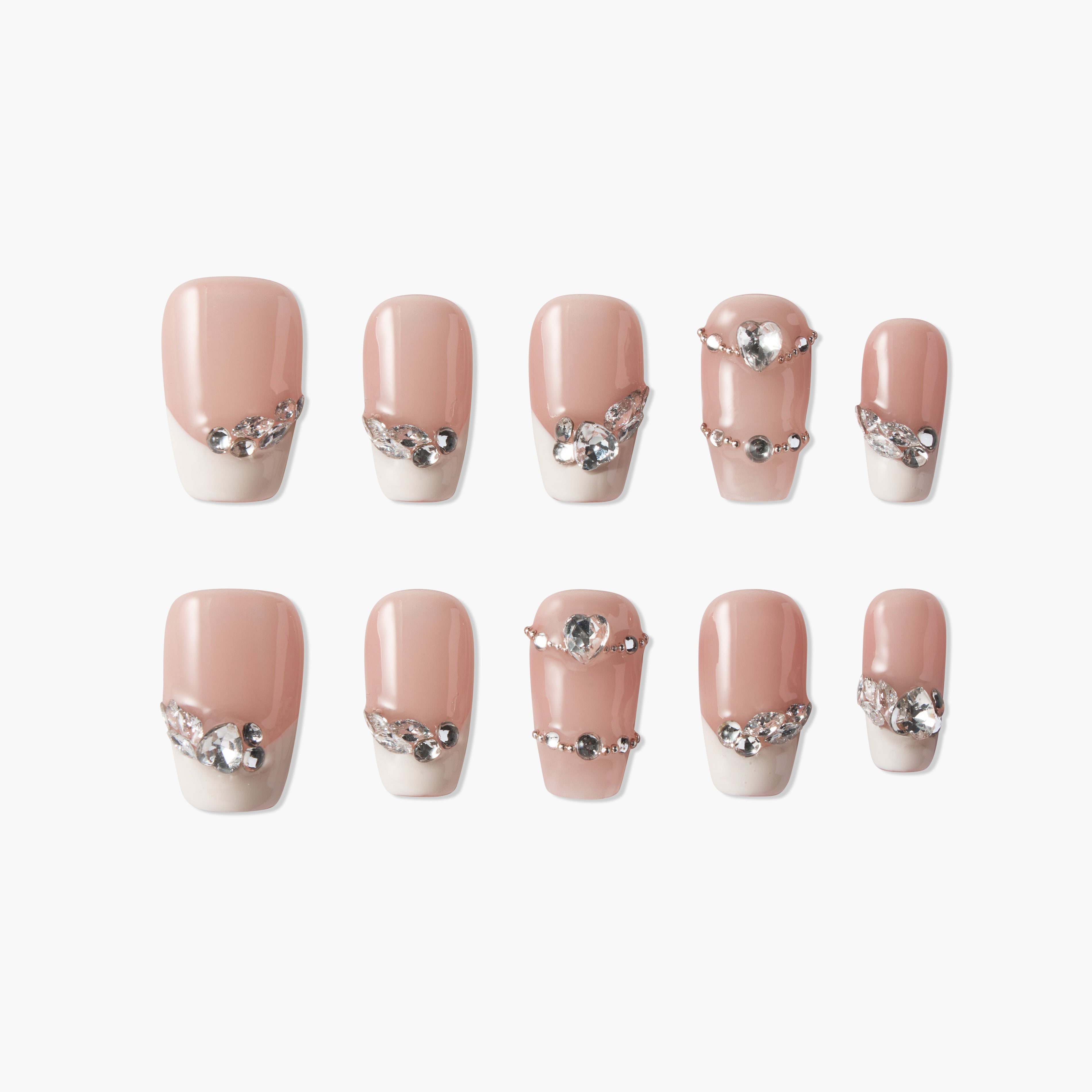 Nude and white French press-on nails with rhinestone and crystal gem accents