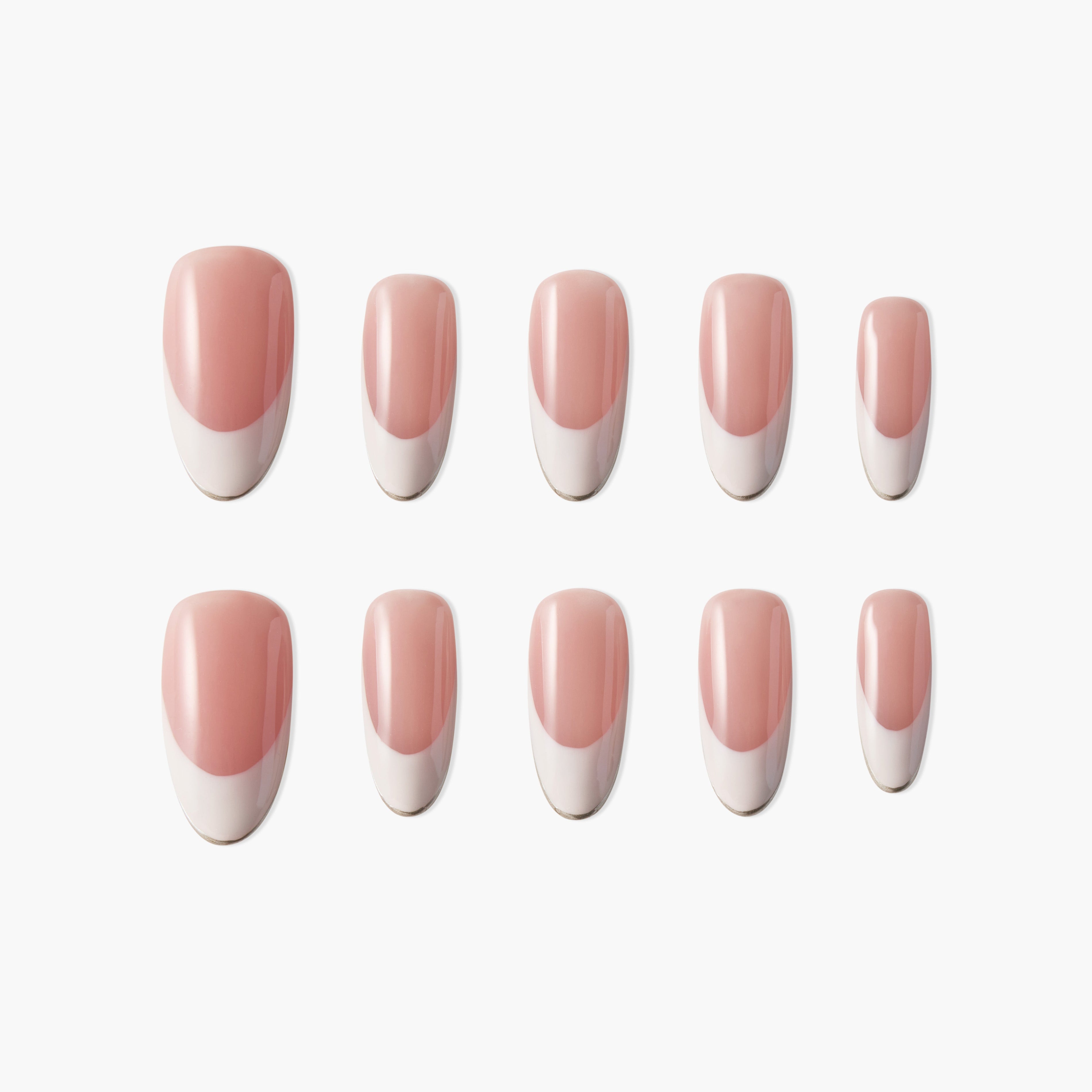 Set of pink and white French tip press-on nails, arranged on a white background.