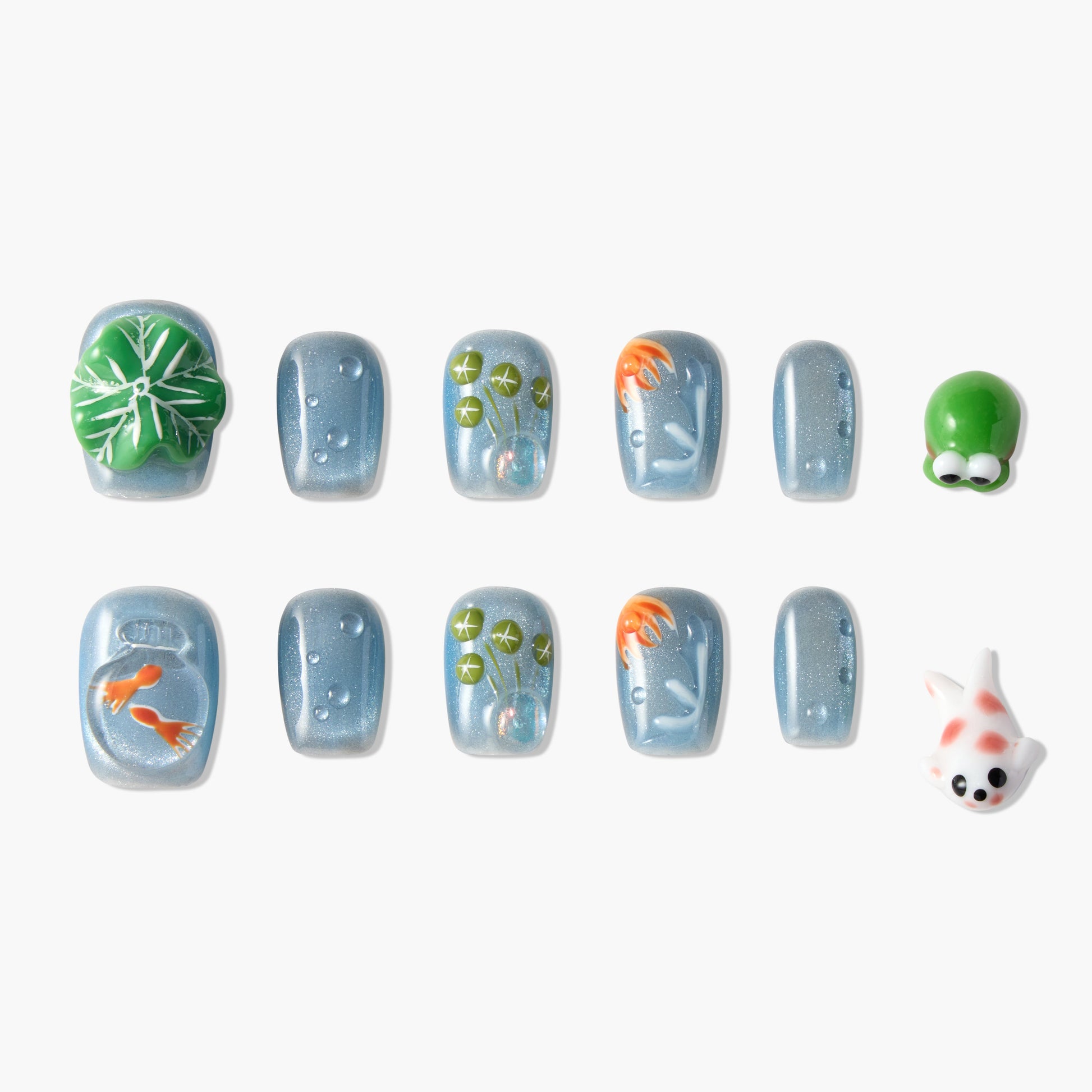 Handmade press-on nails with koi fish, lily pad, and frog designs on blue shimmer background