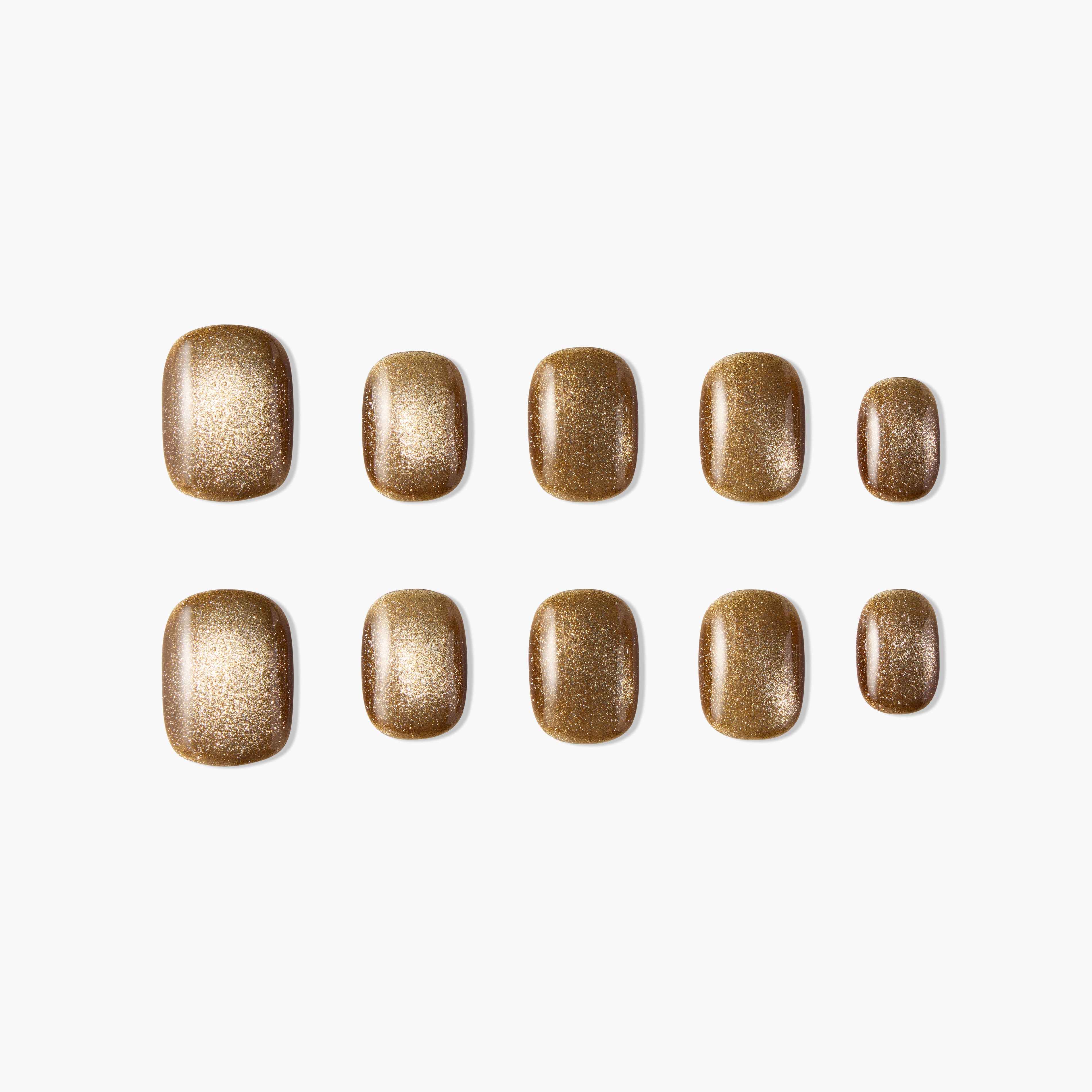 Set of gold glitter press-on nails, oval shape, displayed on a white background.