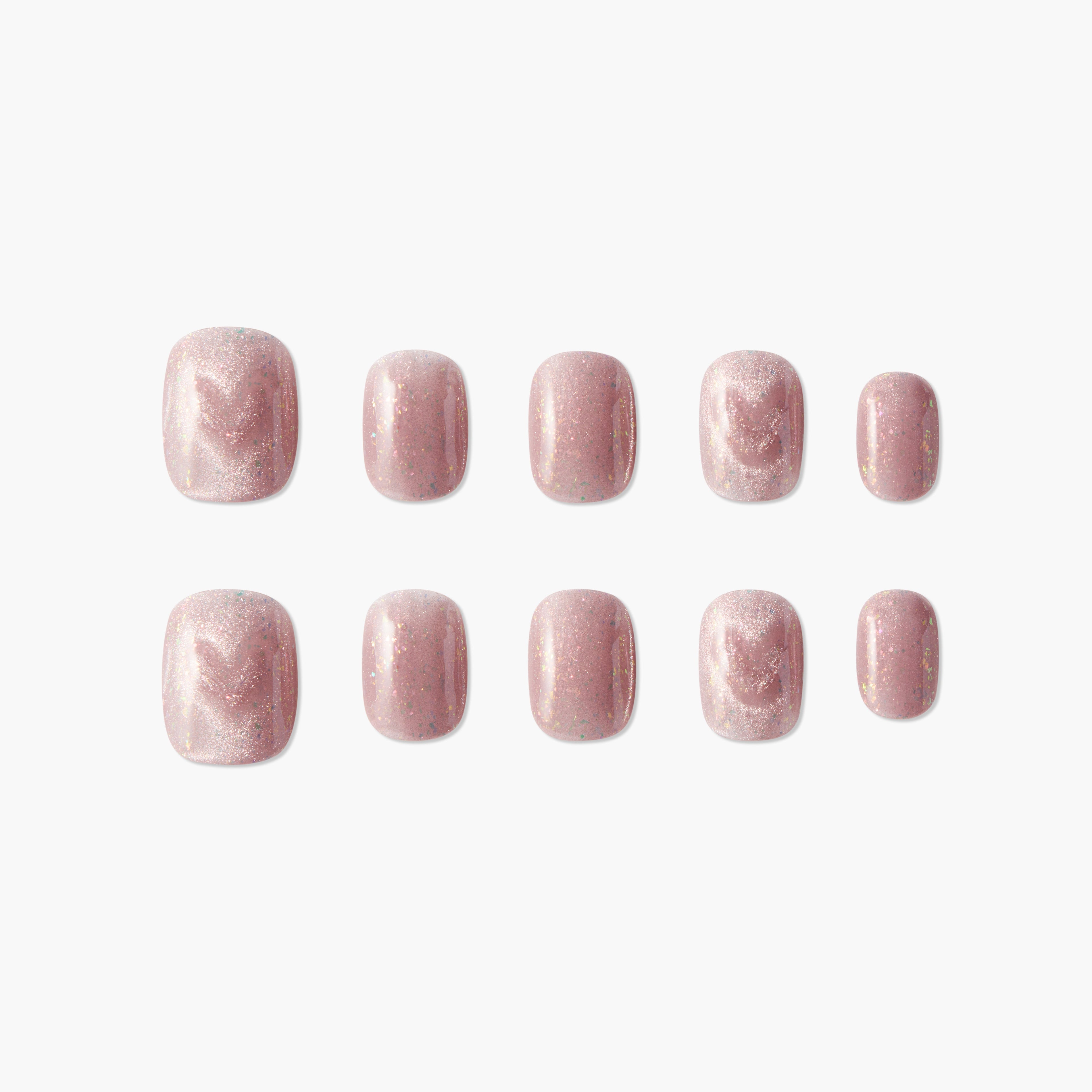 Set of square pink press-on nails with subtle shimmer and marble pattern on white background