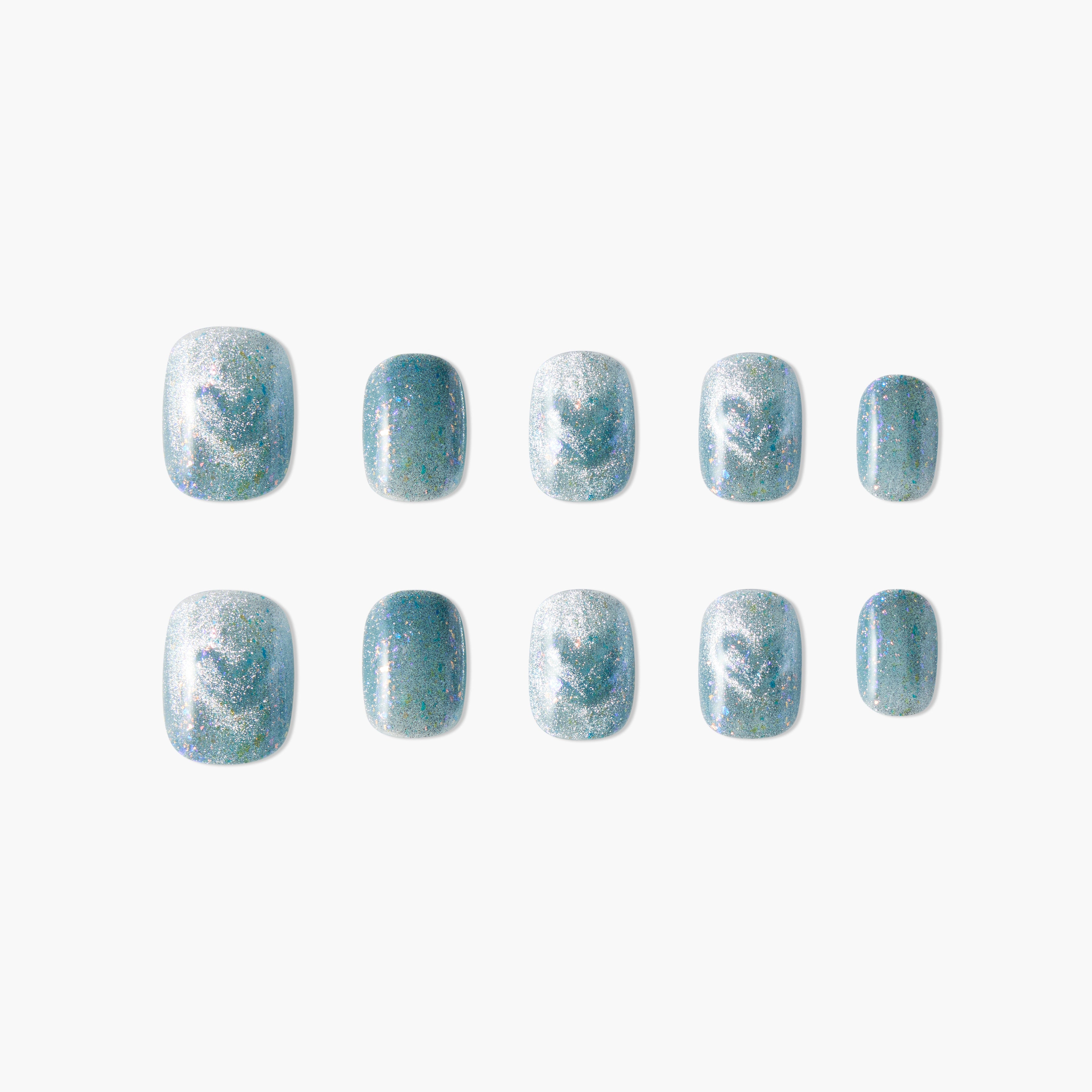Set of blue iridescent press-on nails with glitter on a white background.