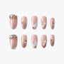 Pink ombre press-on nails with rhinestone, pearl, and iridescent 3D accents, elegant nail art set.