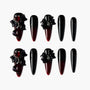 Black and red coffin press-on nails with 3D floral gems and glossy ombre finish