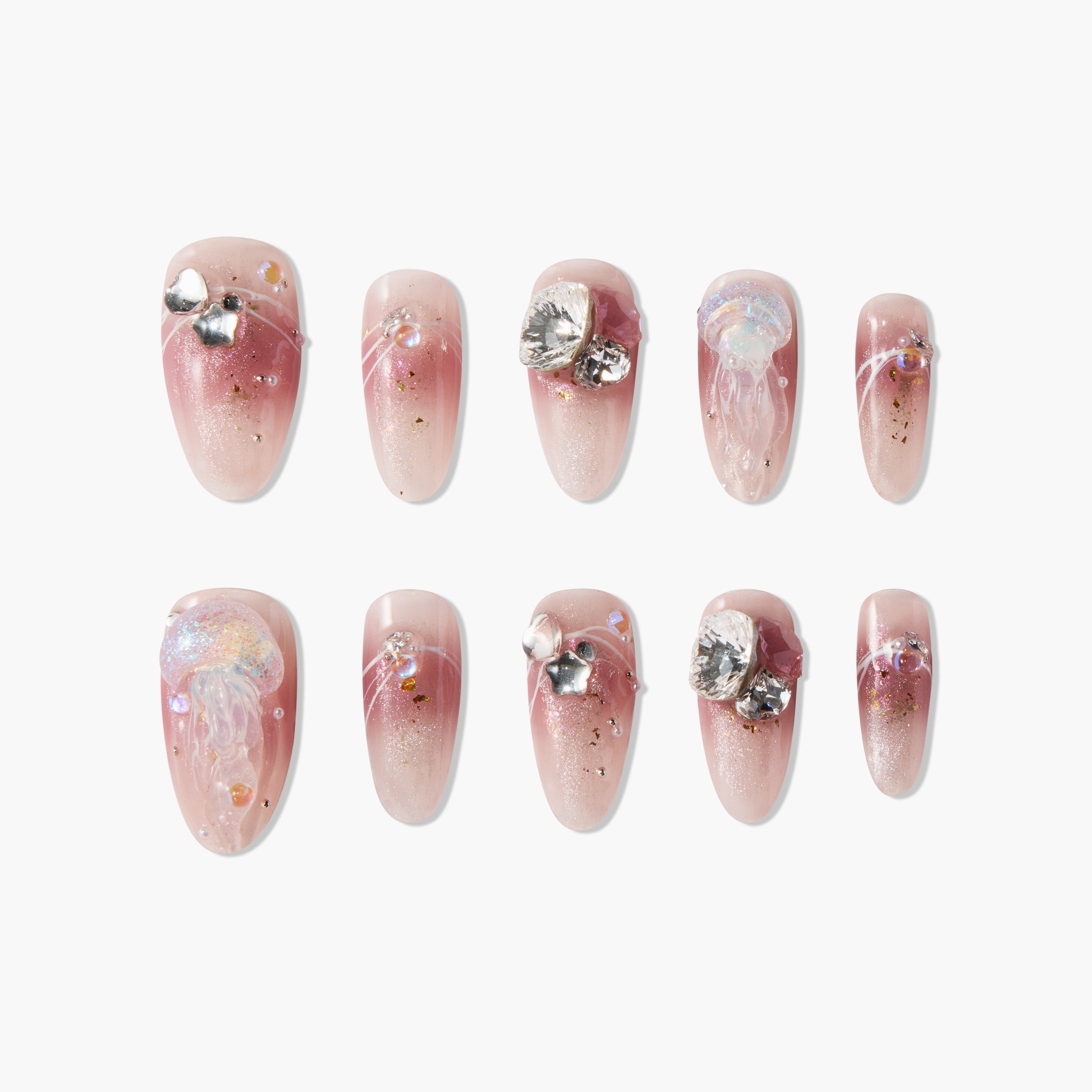 Pink ombre press-on nails with glitter, 3D jellyfish, rhinestones, and metallic accents