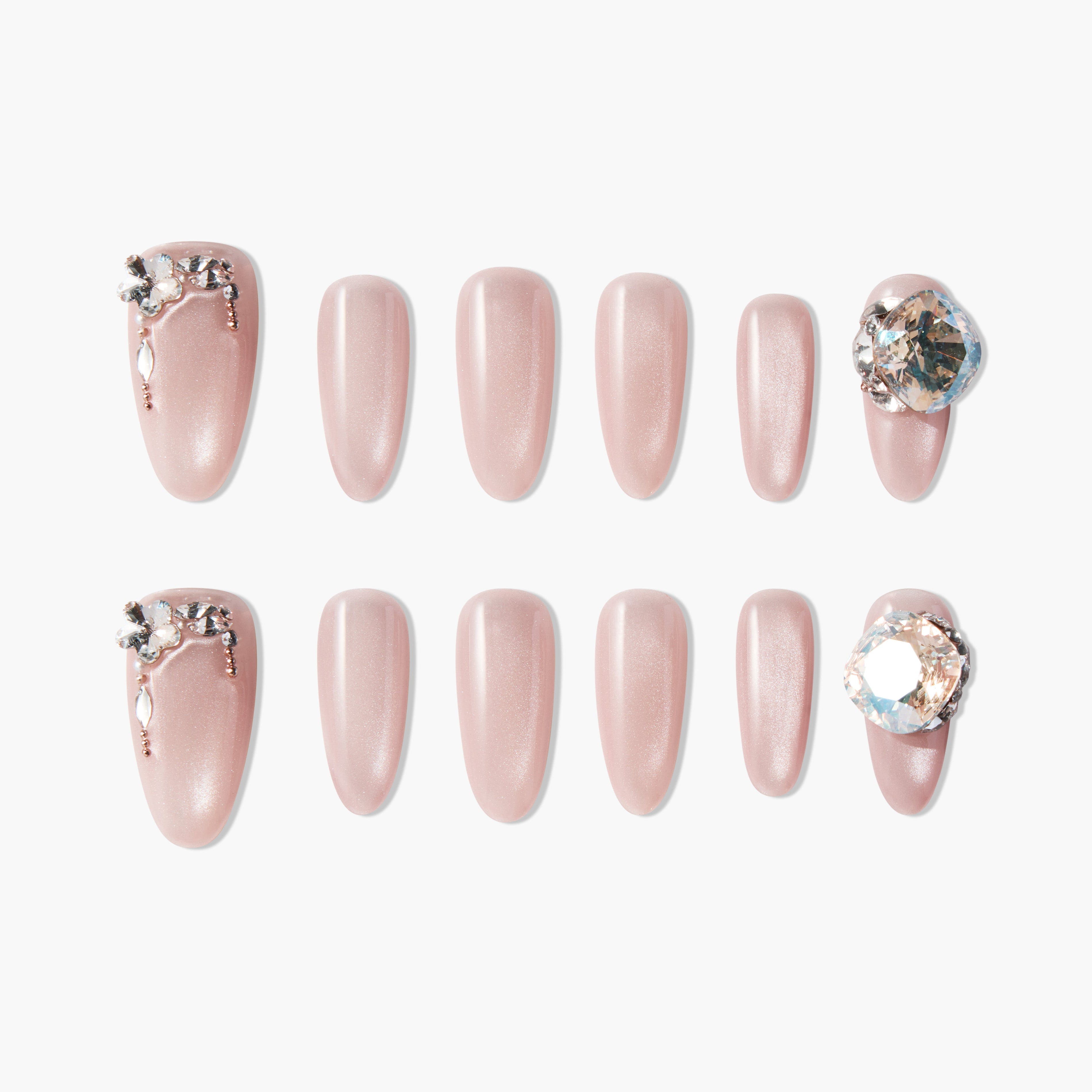 Set of nude pink press-on nails with sparkling rhinestone and floral decorations