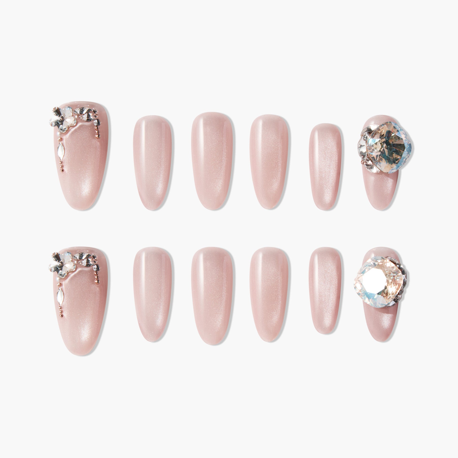 Set of nude pink press-on nails with sparkling rhinestone and floral decorations