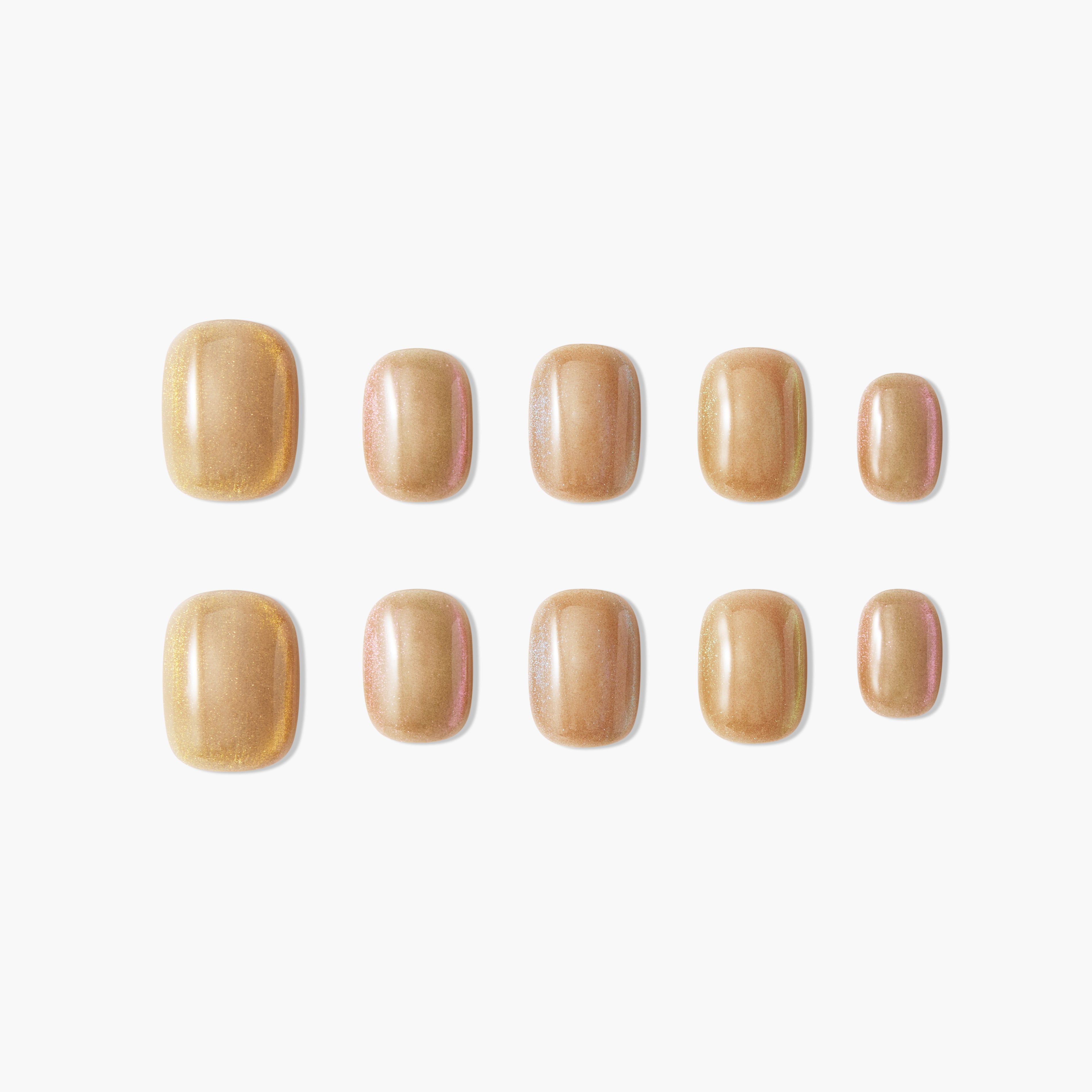 Set of glossy gold iridescent press-on nails arranged neatly on a white background