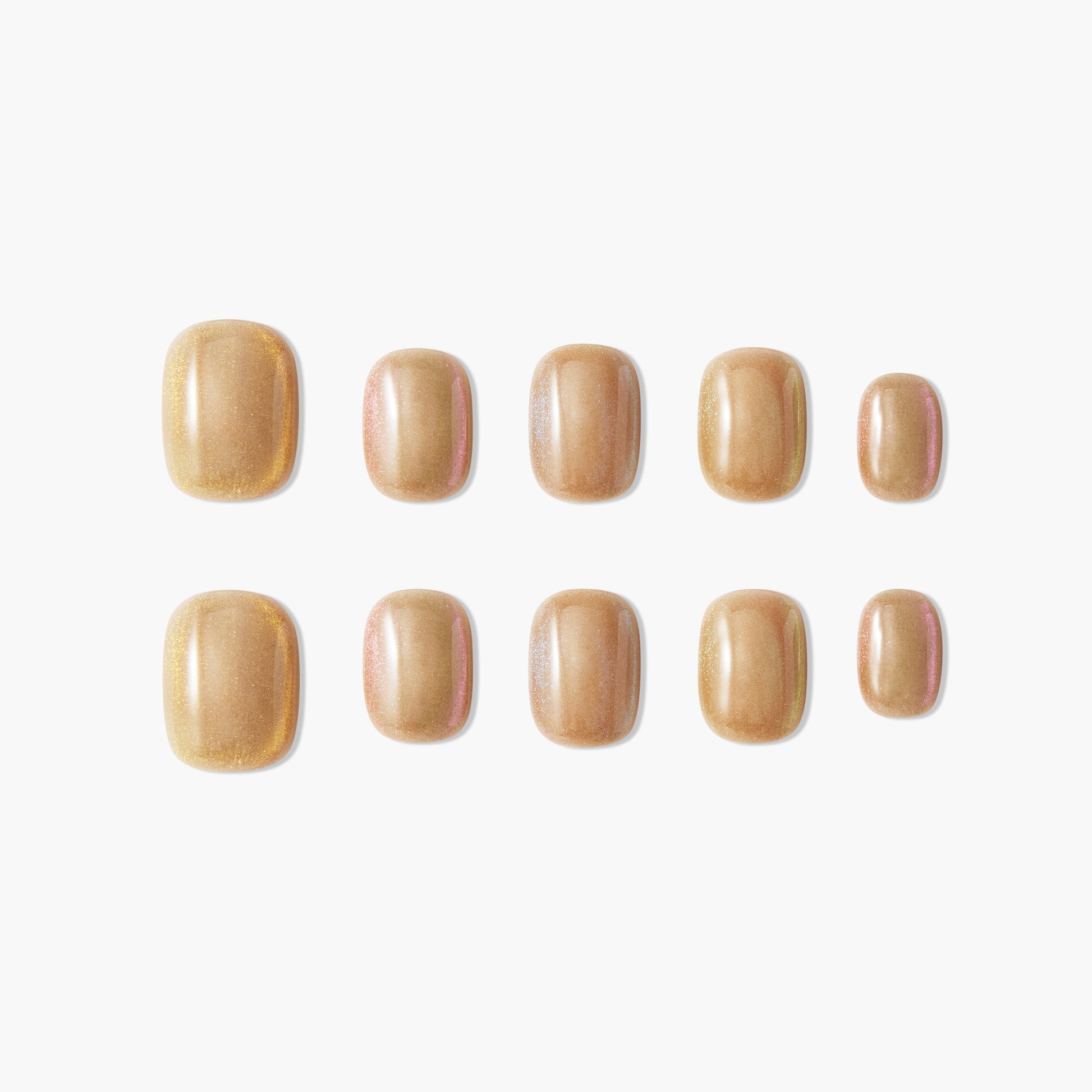 Set of glossy gold iridescent press-on nails arranged neatly on a white background