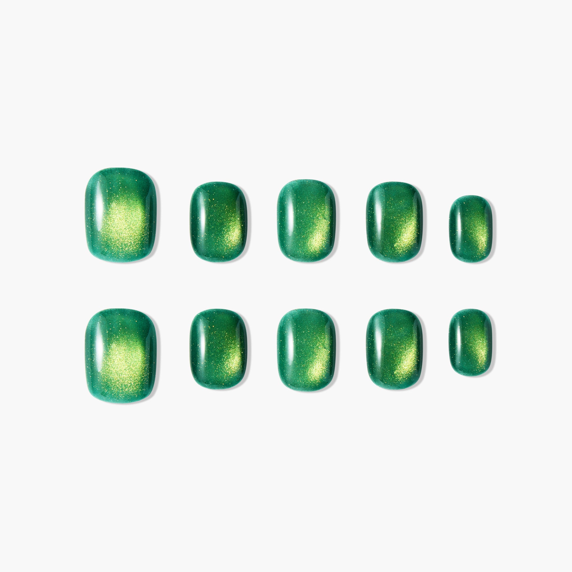 Glossy green press-on nails with metallic gold shimmer, arranged on a white background.