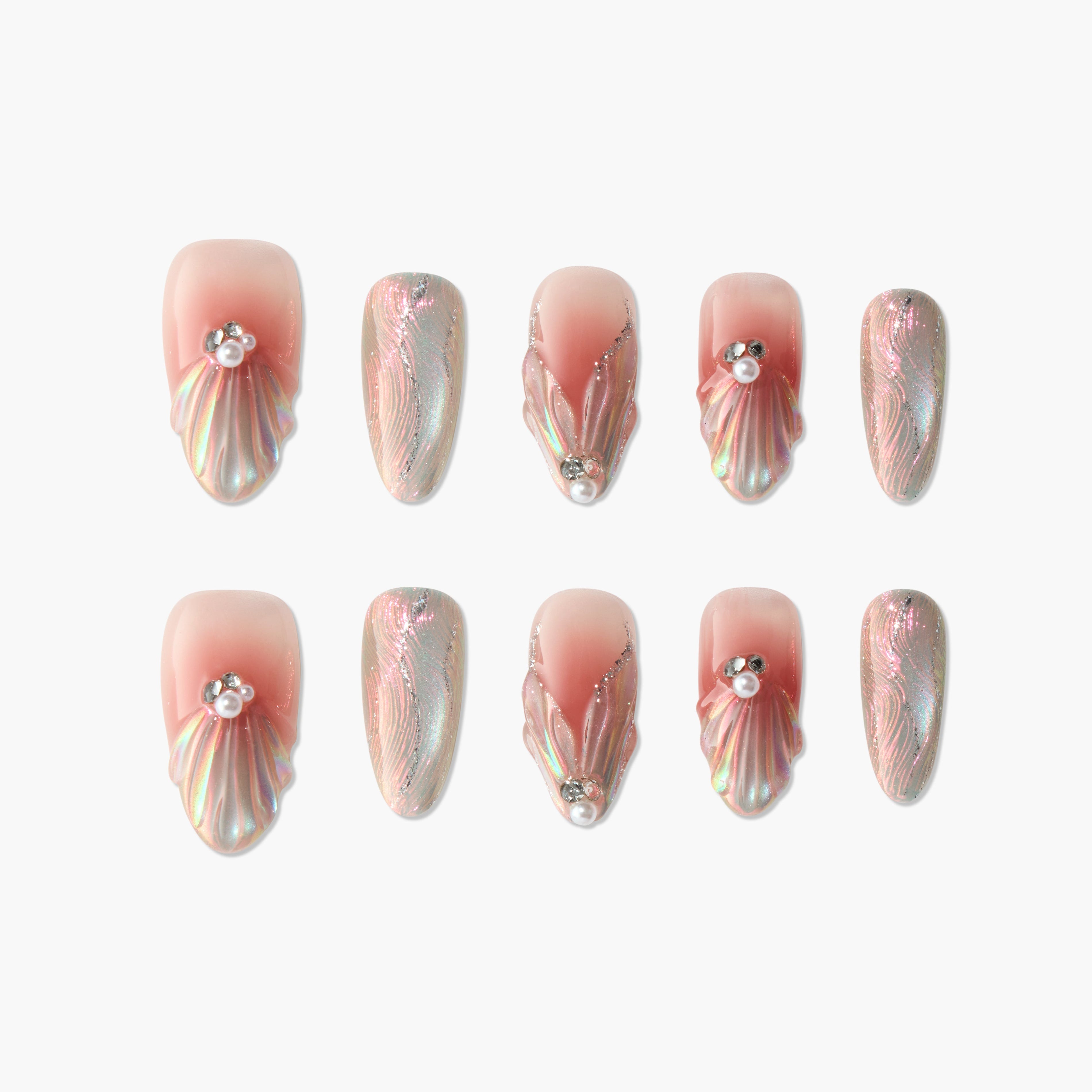 Iridescent pink press-on nails with pearl and rhinestone accents, seashell-inspired design