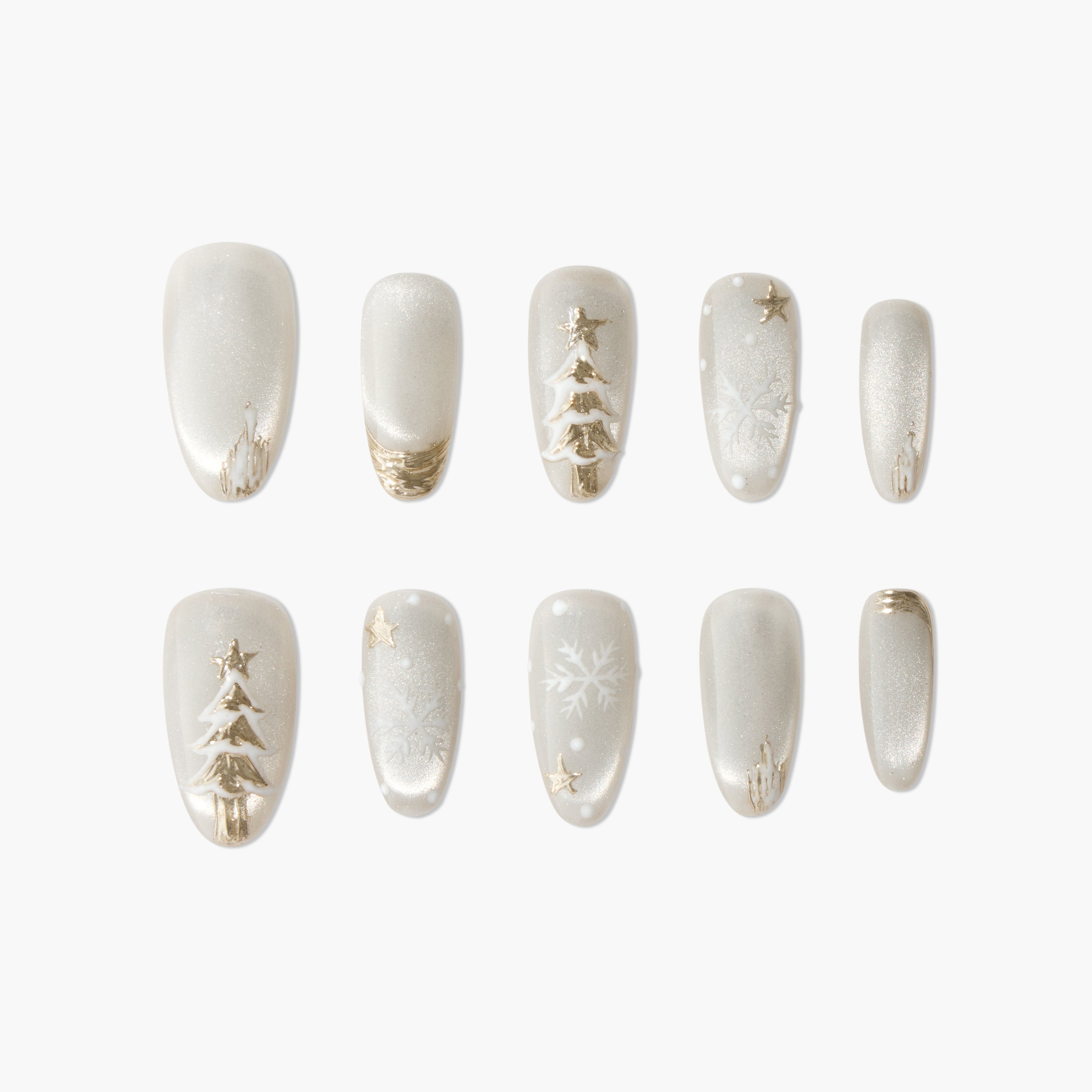 Handmade press-on nails with gold Christmas tree, snowflake, and star designs on pearly white base