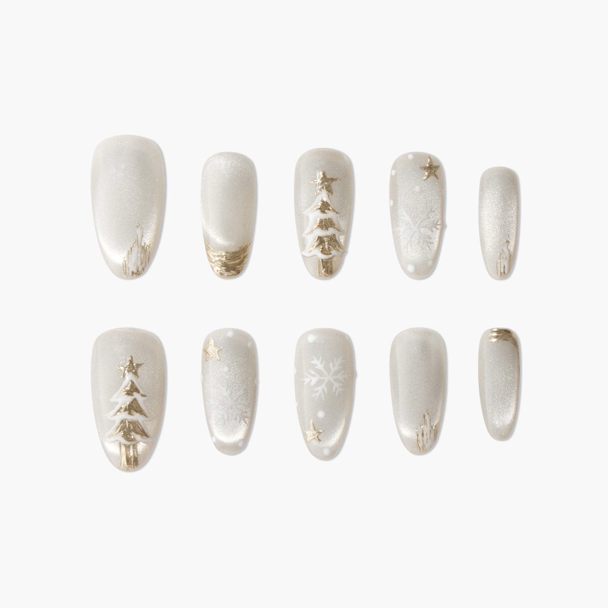 Handmade press-on nails with gold Christmas tree, snowflake, and star designs on pearly white base