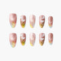 Handmade press-on nails with pink shimmer, floral and pastel yellow-white accents