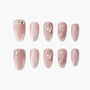 Pink handmade press-on nails with rhinestone and pearl accents, shimmery finish, swan design.