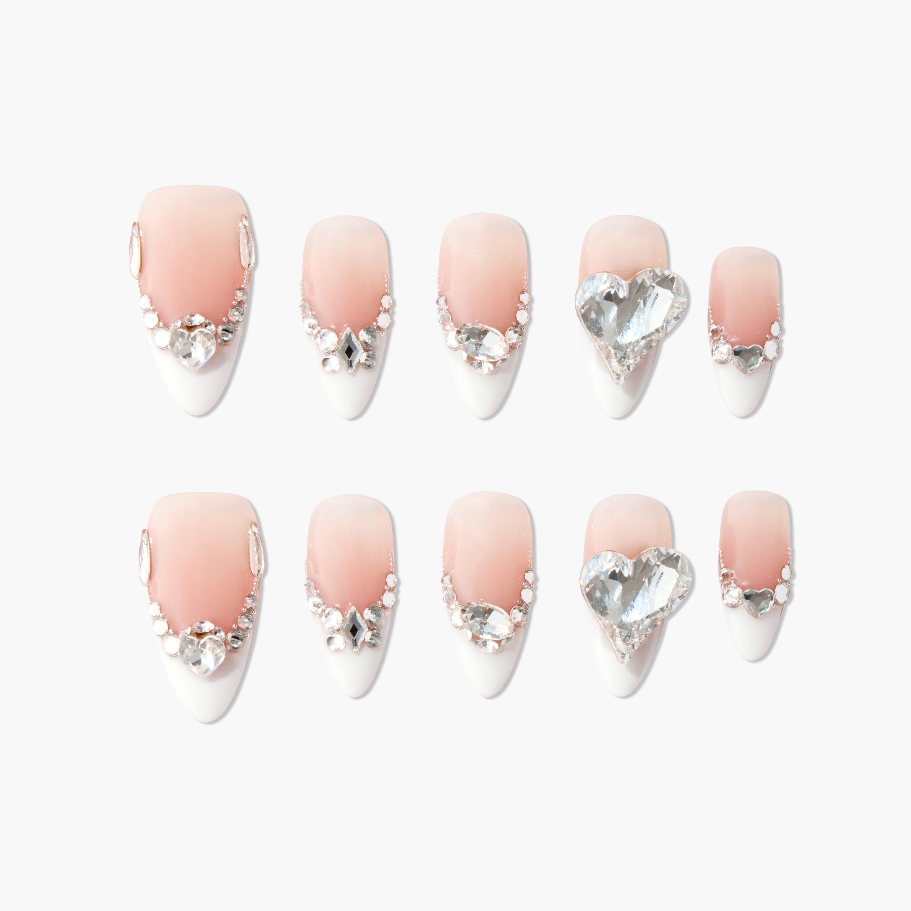 Handmade press-on nails with pink ombre, white tips, and crystal rhinestone accents