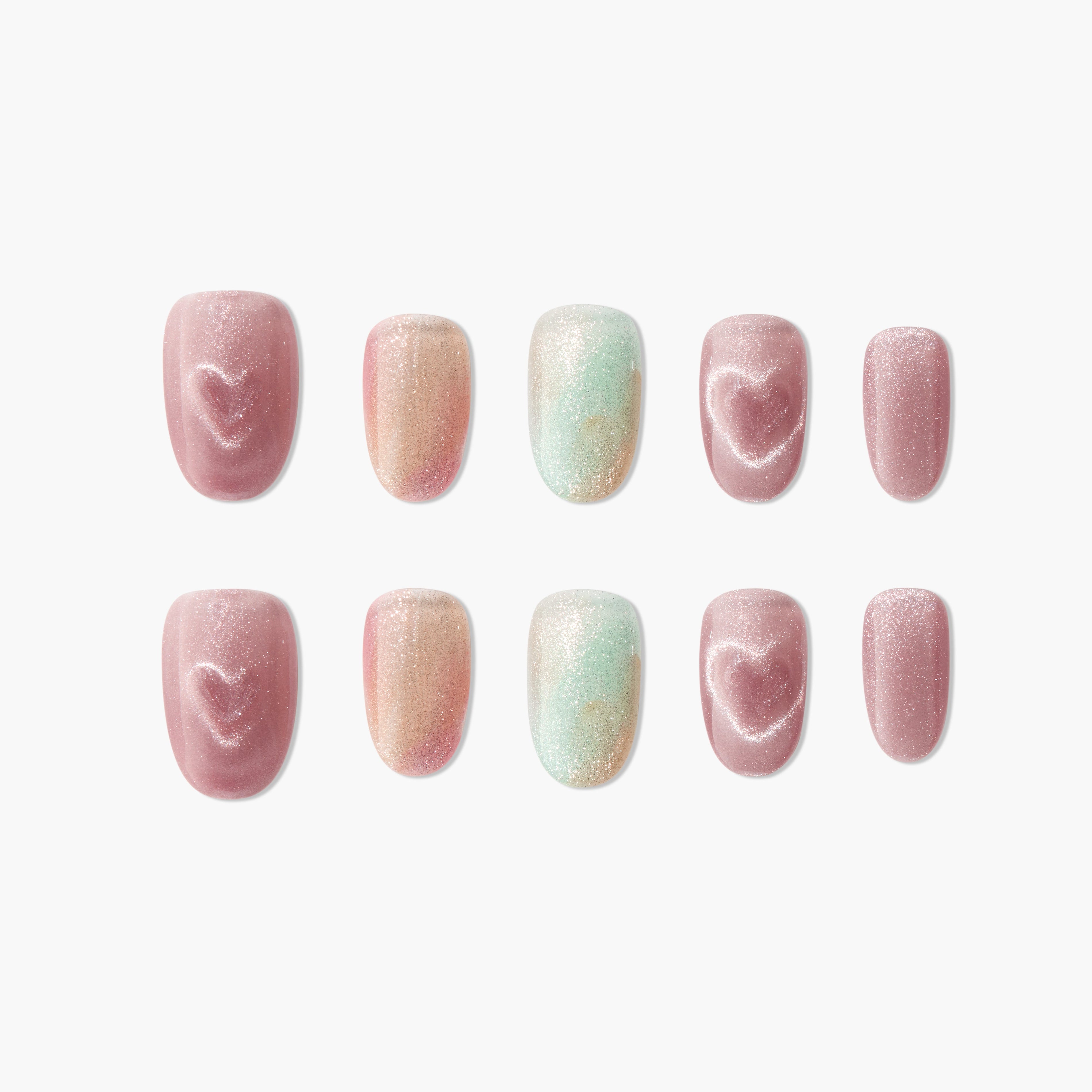 Handmade press-on nails with pink shimmer, heart designs, and pastel gradient accents