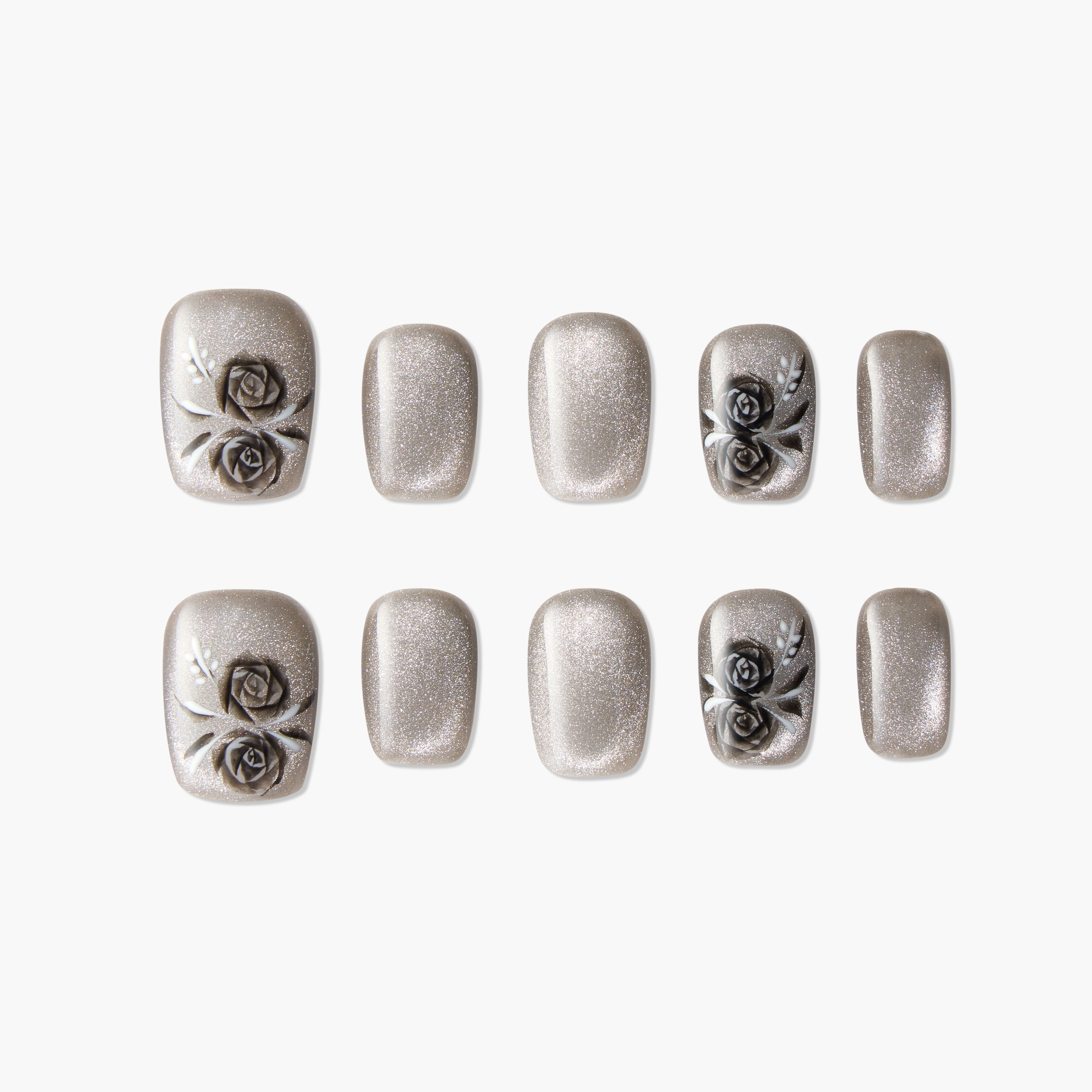 Glittery silver press-on nails with 3D black rose floral accents, reusable and handmade.