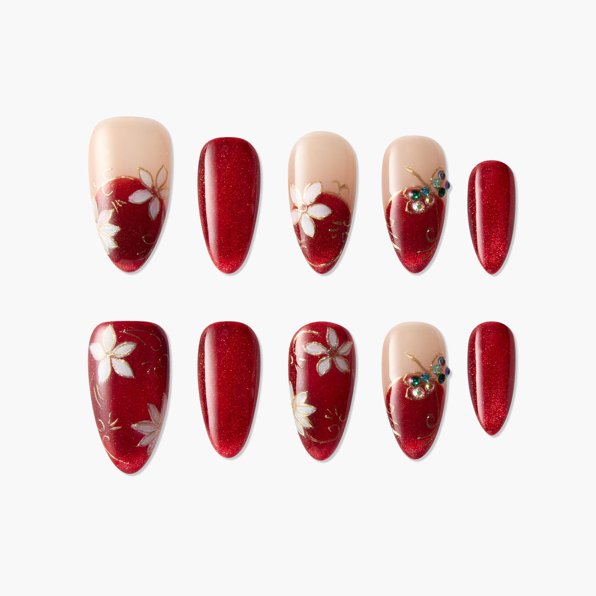Red and nude floral press-on nails with gemstone accents and gold detailing, oval shape.