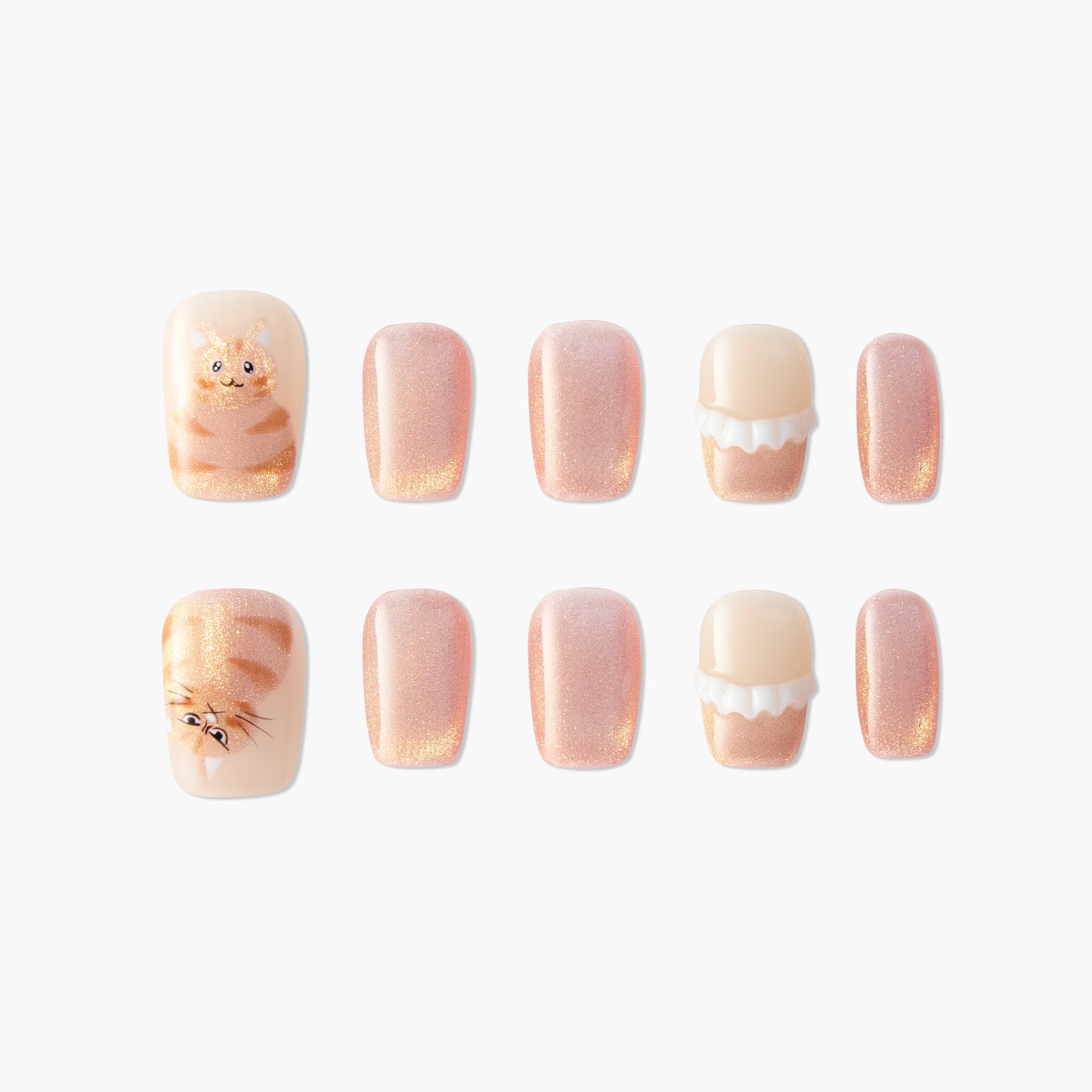 Handmade press-on nails with glittery peach tones, cat art, and dessert-inspired designs