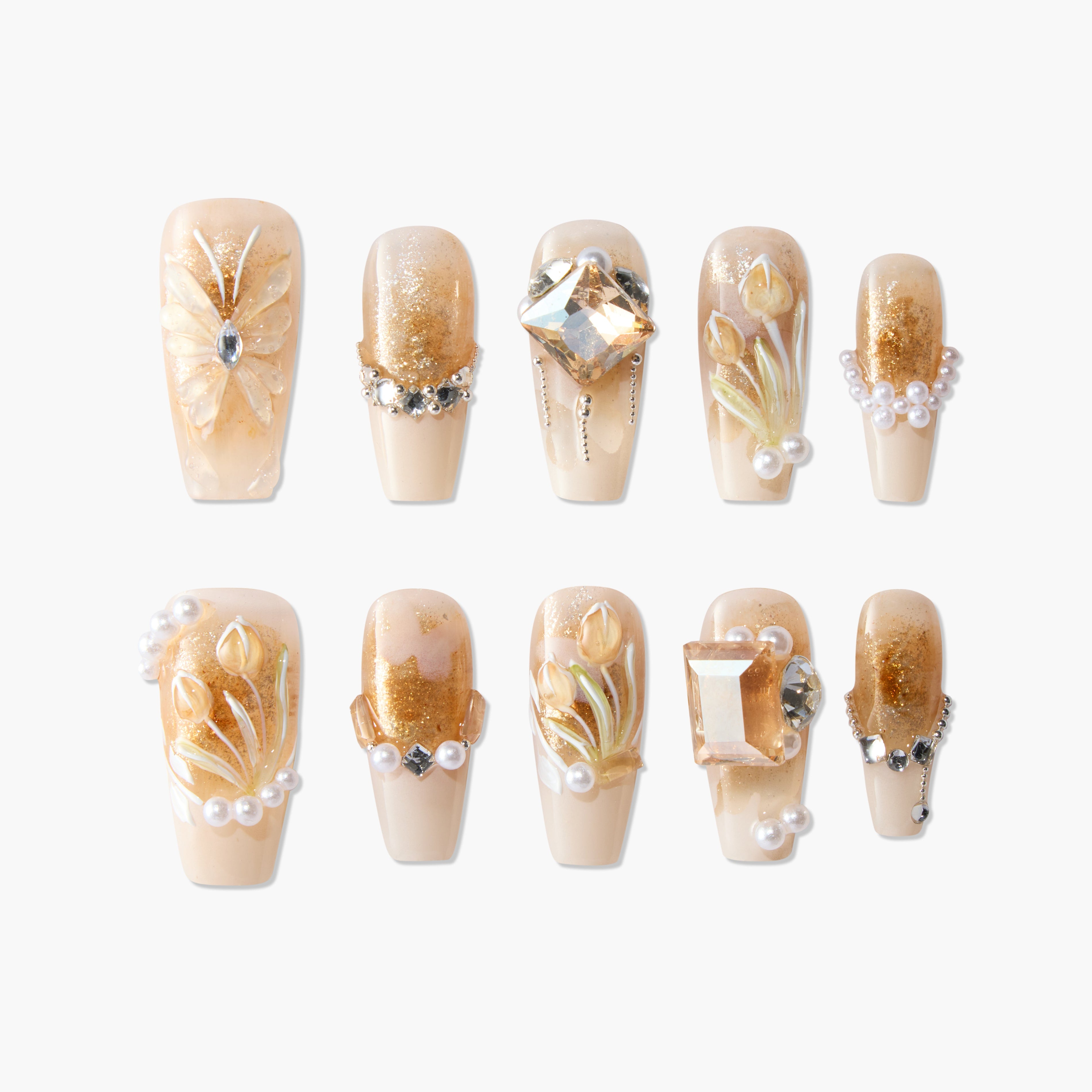 Handmade press-on nails with gold glitter, 3D floral designs, pearls, and crystal gems