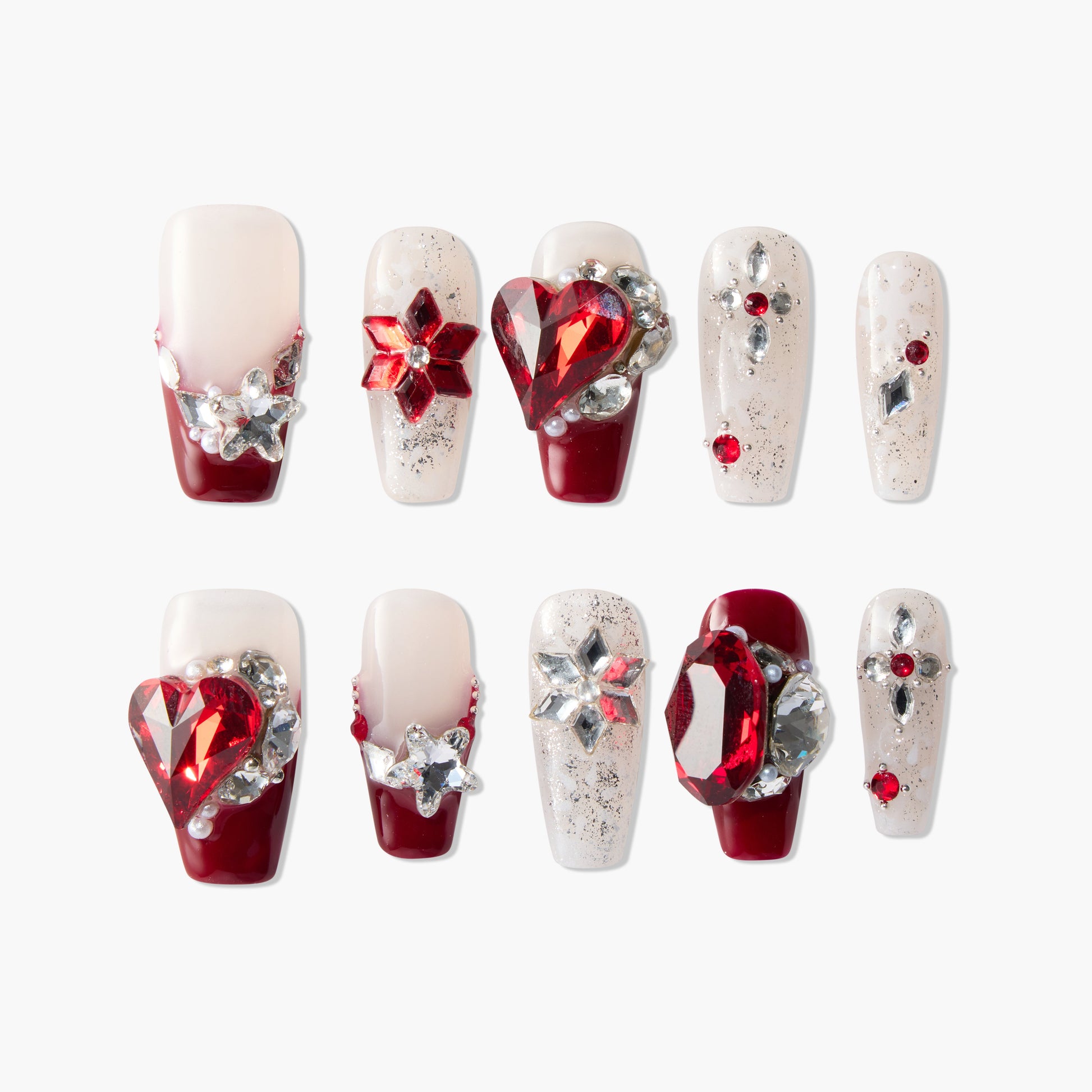 Handmade press-on nails with red and silver gems, glitter, and 3D embellishments